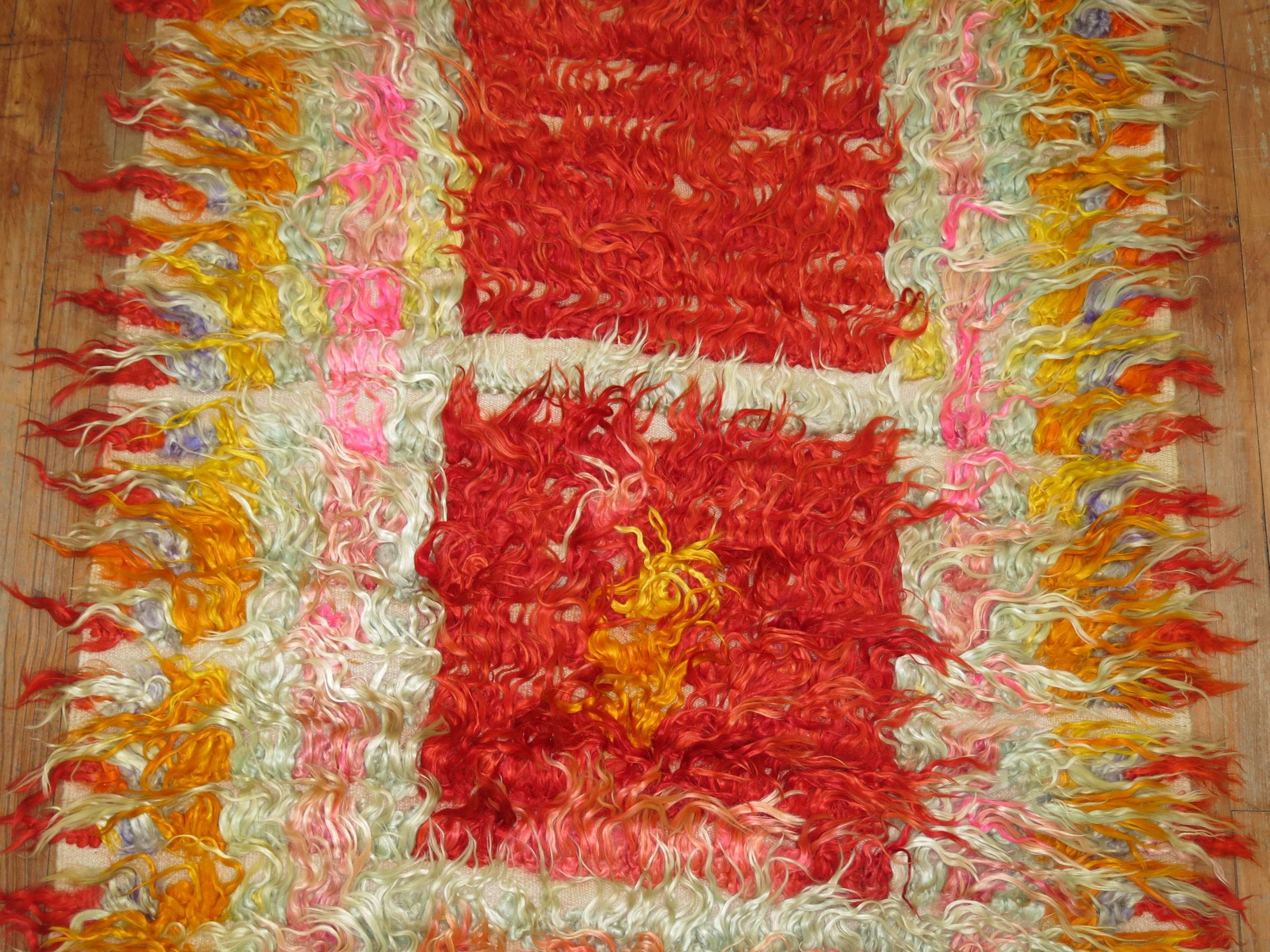 Fun and colorful long haired angora-goat Filiki rug was handwoven in the villages of Central Anatolia in the mid-20th century.
   