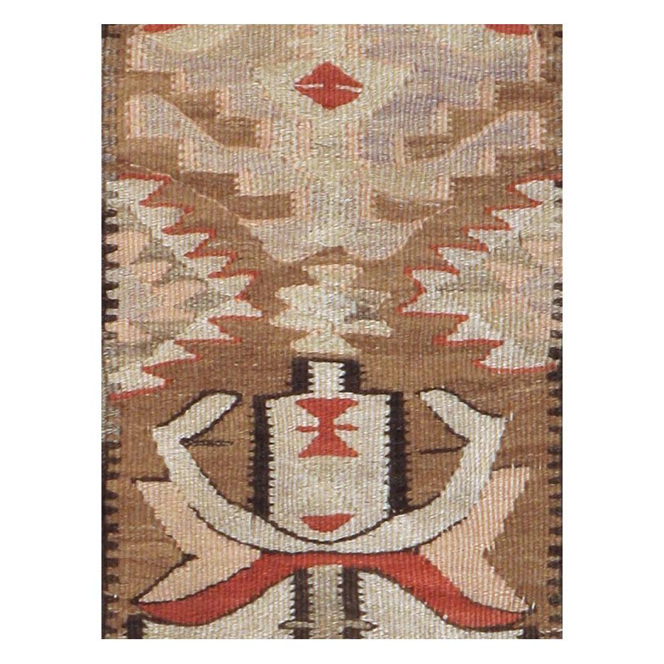A vintage Turkish flat-woven Kilim carpet in runner format from the second quarter of the 20th century.