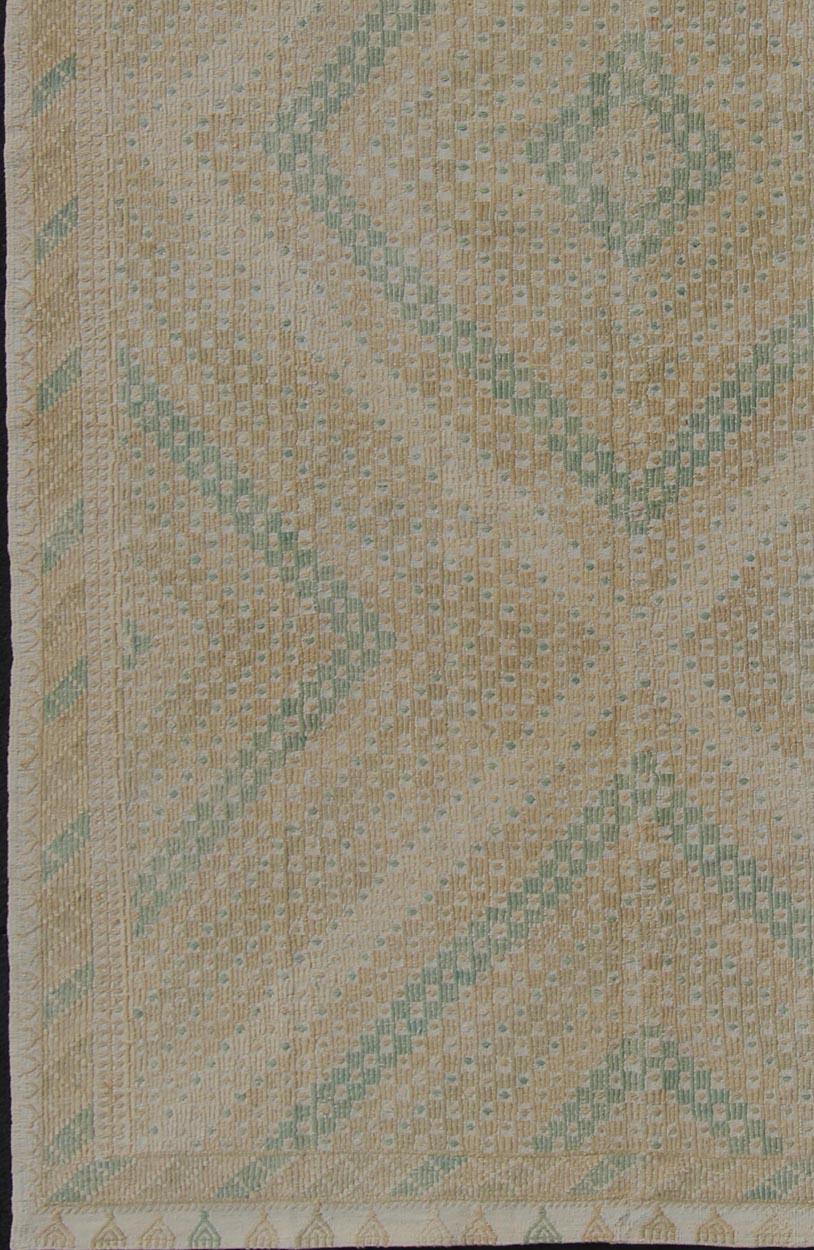 Taupe, tan, cream, and sea-foam green geometric design vintage embroidered Kilim rug from Turkey, rug en-01, country of origin / type: Turkey / Kilim, circa 1950

Featuring a beautiful geometric diamond design rendered in muted tones, this unique