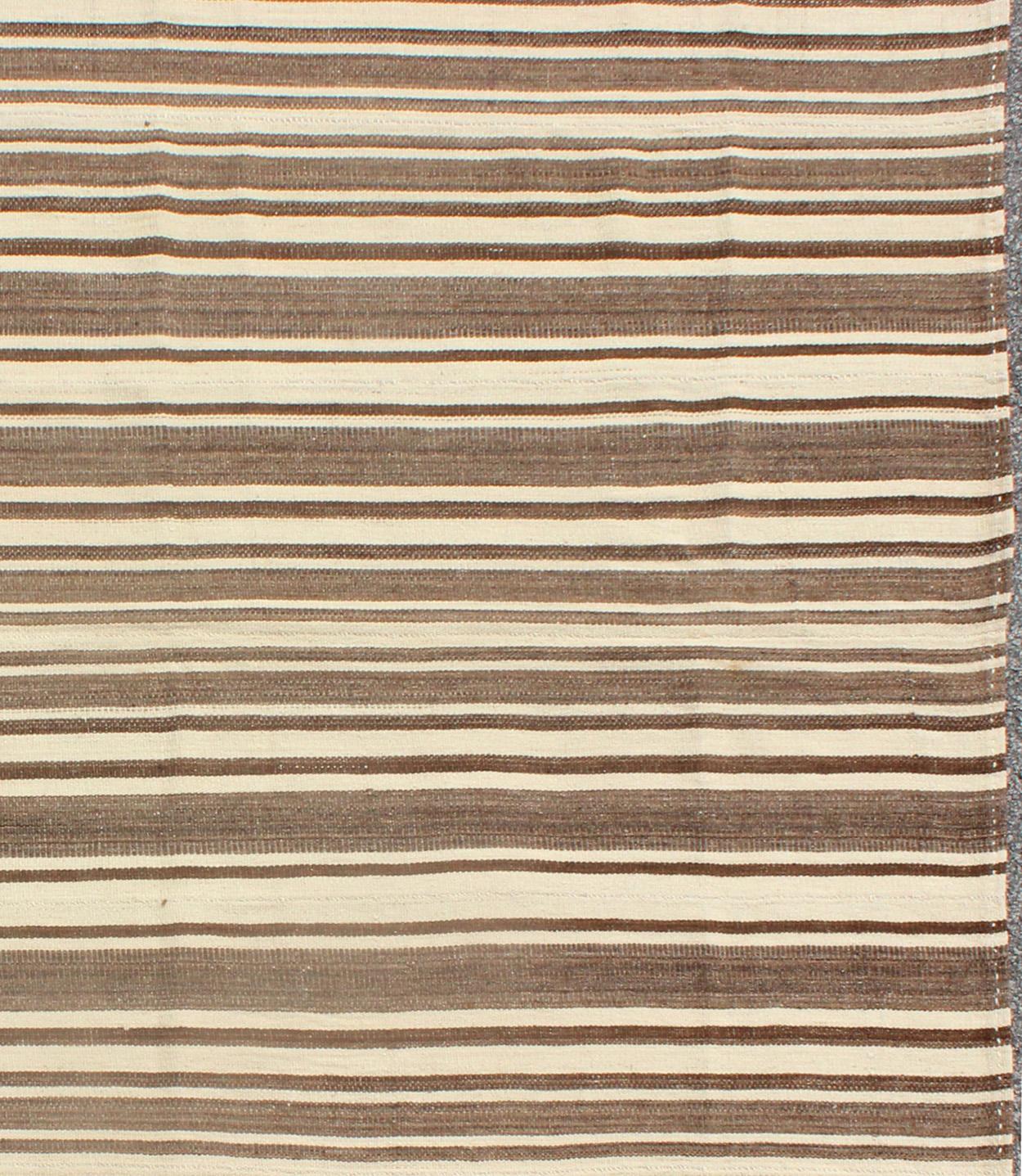 Minimalist design Stripe vintage Kilim from Turkey, rug TU-NED-4724, country of origin / type: Turkey / Kilim, circa 1950

Measures: 6 x 6'7 

This vintage flat-woven Kilim features a minimalist design rendered in thin brown, light blue,