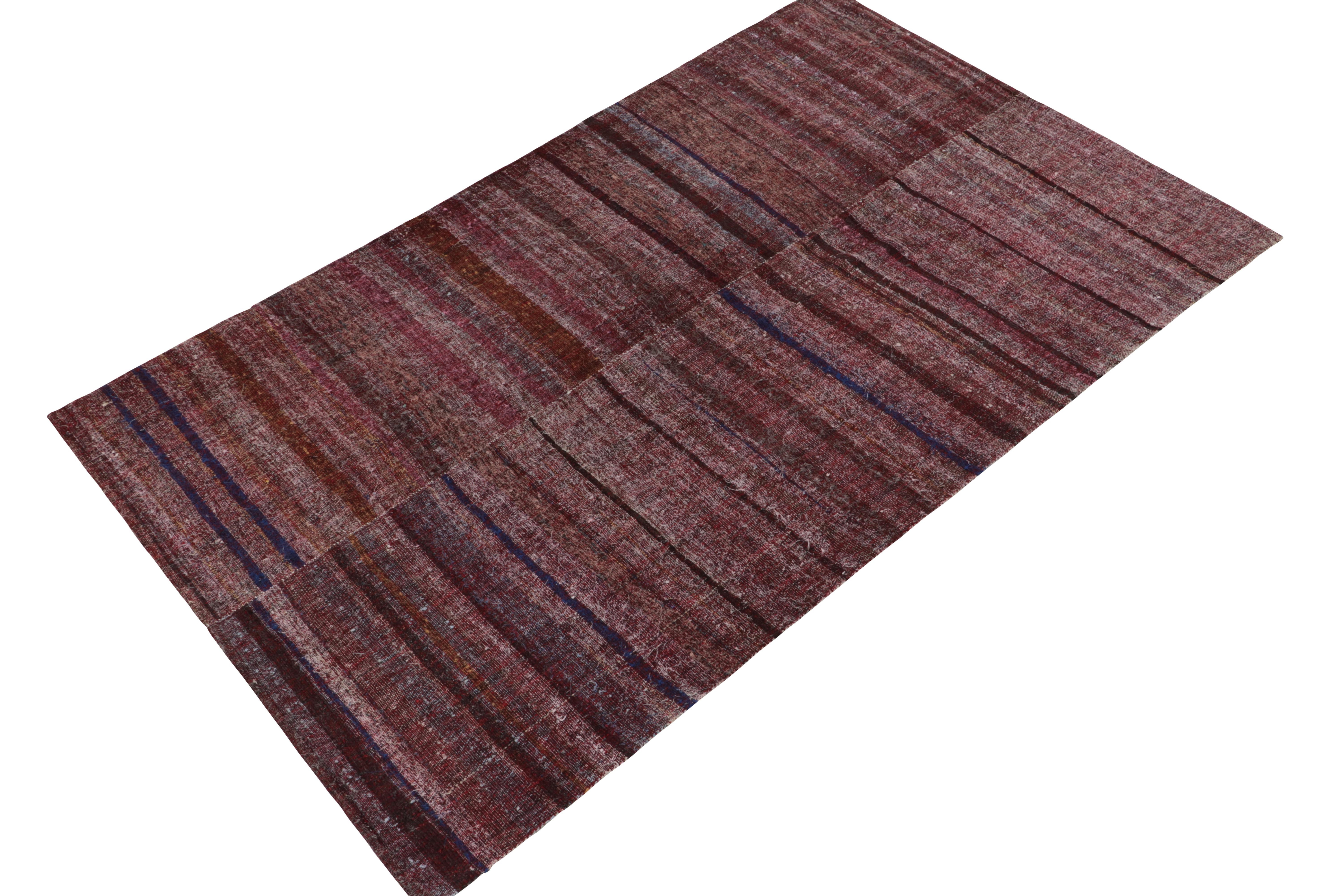 Connoting mid-century wool panel-weaving aesthetics, a 6x9 vintage kilim rug originating from Turkey circa 1950-1960. This particular design plays two distinct halves into one relishing prevailing tones of rare purple, accented with whimsical