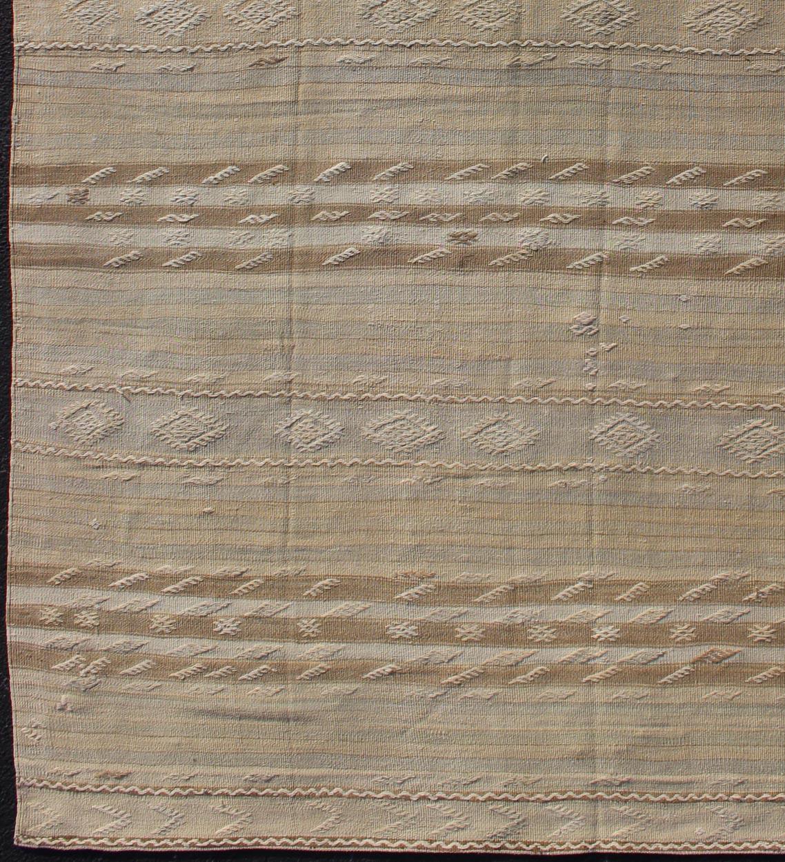 Minimalist stripe design Kilim from Turkey, rug EN-179246, country of origin / type: Turkey / Kilim, circa 1950

This vintage flat-woven Kilim runner features a Minimalist design rendered in thin brown stripes, set atop a taupe background with