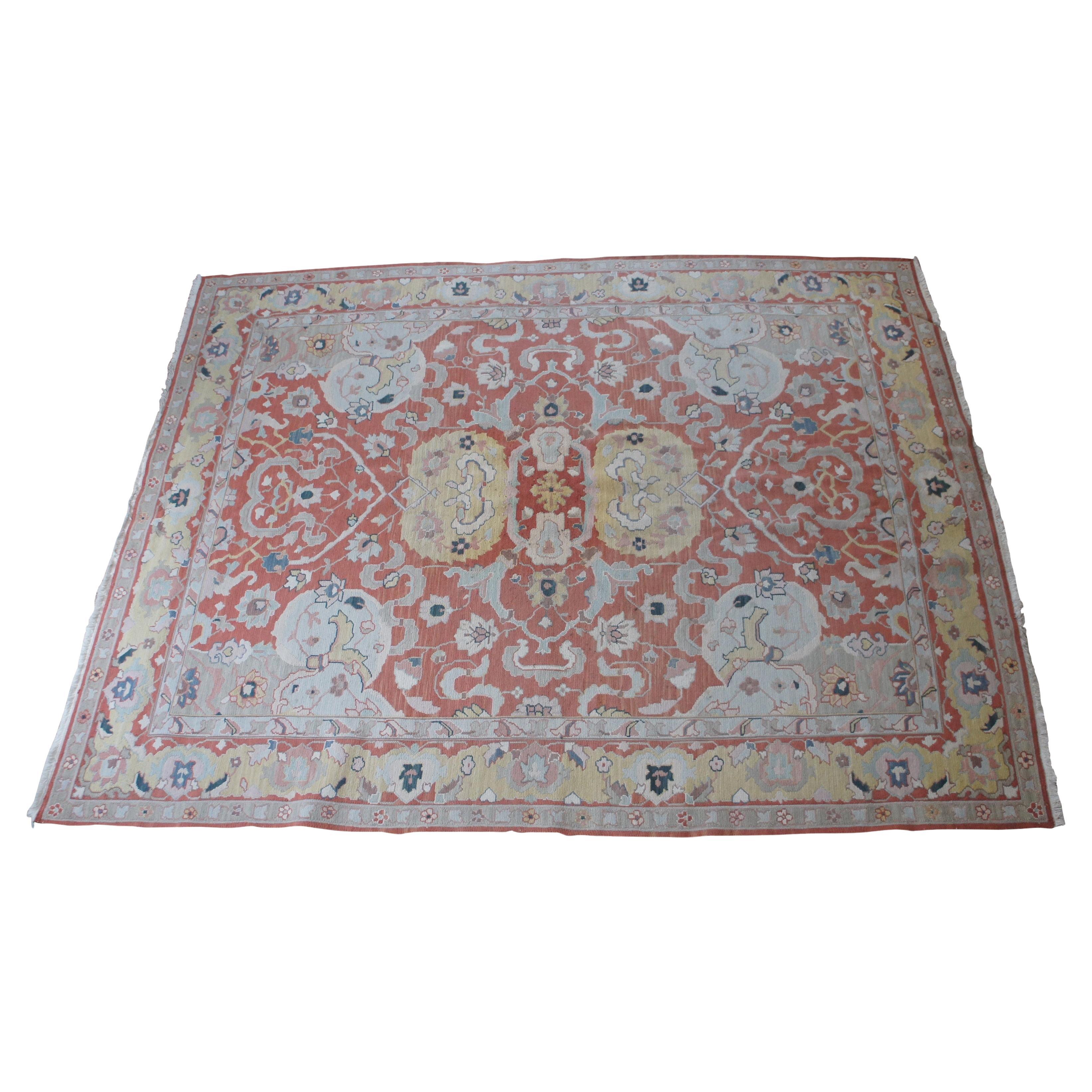 Kilim turc vintage tissé à plat.  Caractéristiques Pile de laine avec un premier plan rose et des motifs de feuillage géométriques.

Dimensions :
94