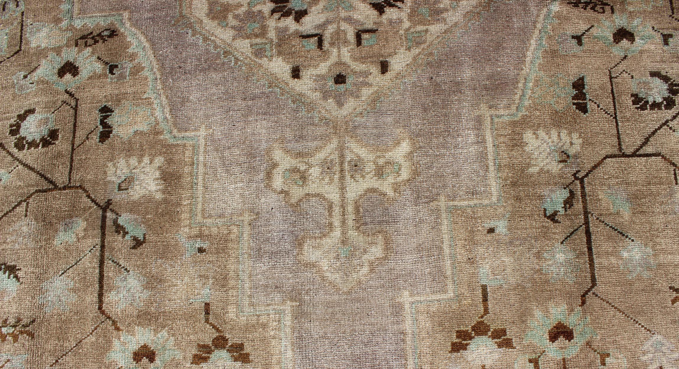 Wool Vintage Turkish Floral Medallion Oushak in Earth Tones, Lavender, and Ice Blue For Sale