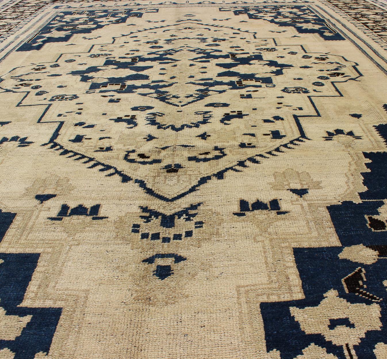 Vintage Turkish Medallion Oushak Rug in Navy Blue, D. Brown and Cream Tones In Good Condition For Sale In Atlanta, GA