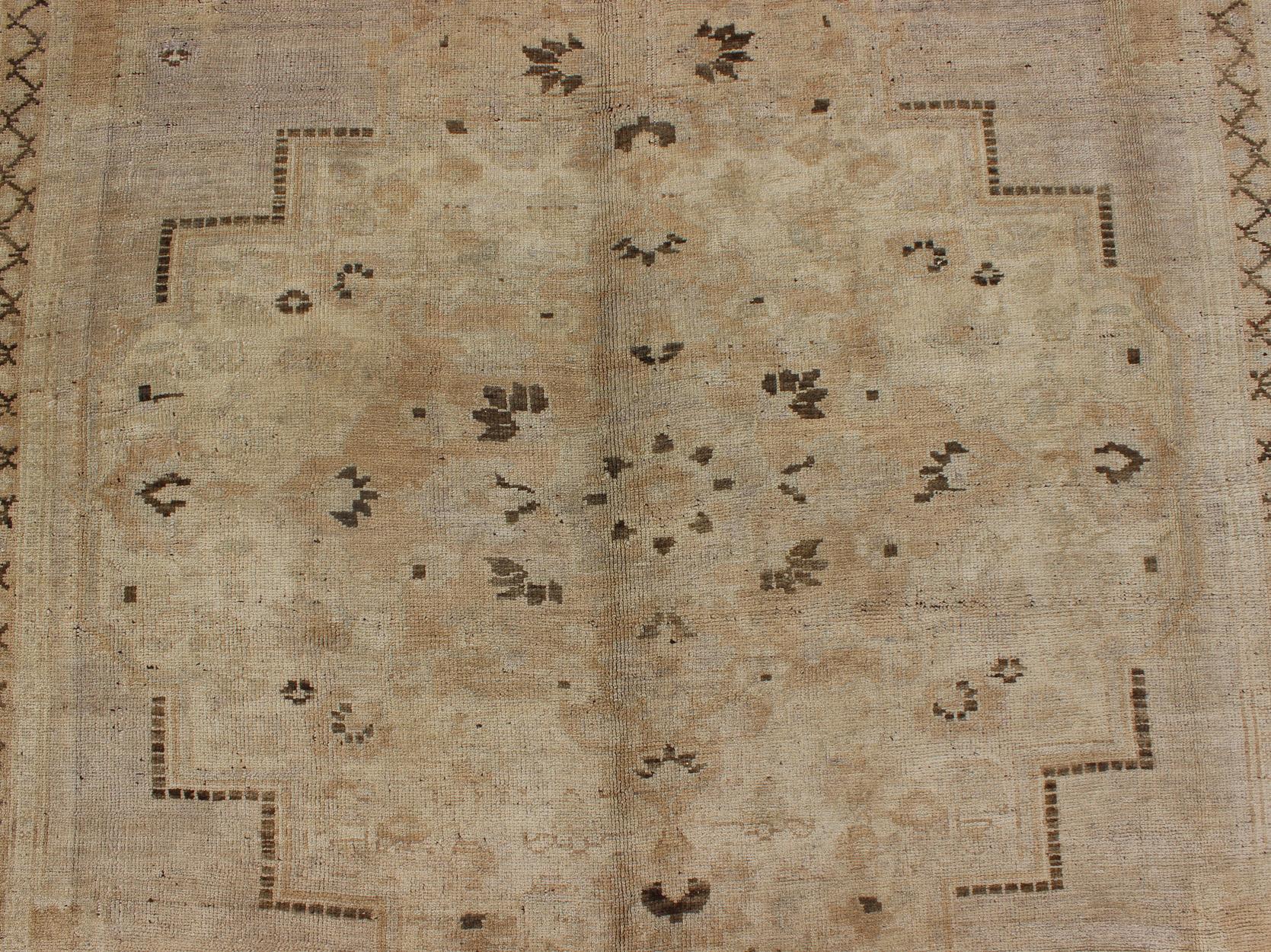 20th Century Vintage Turkish Floral Medallion Oushak Rug in Tan, Brown, and Beige For Sale