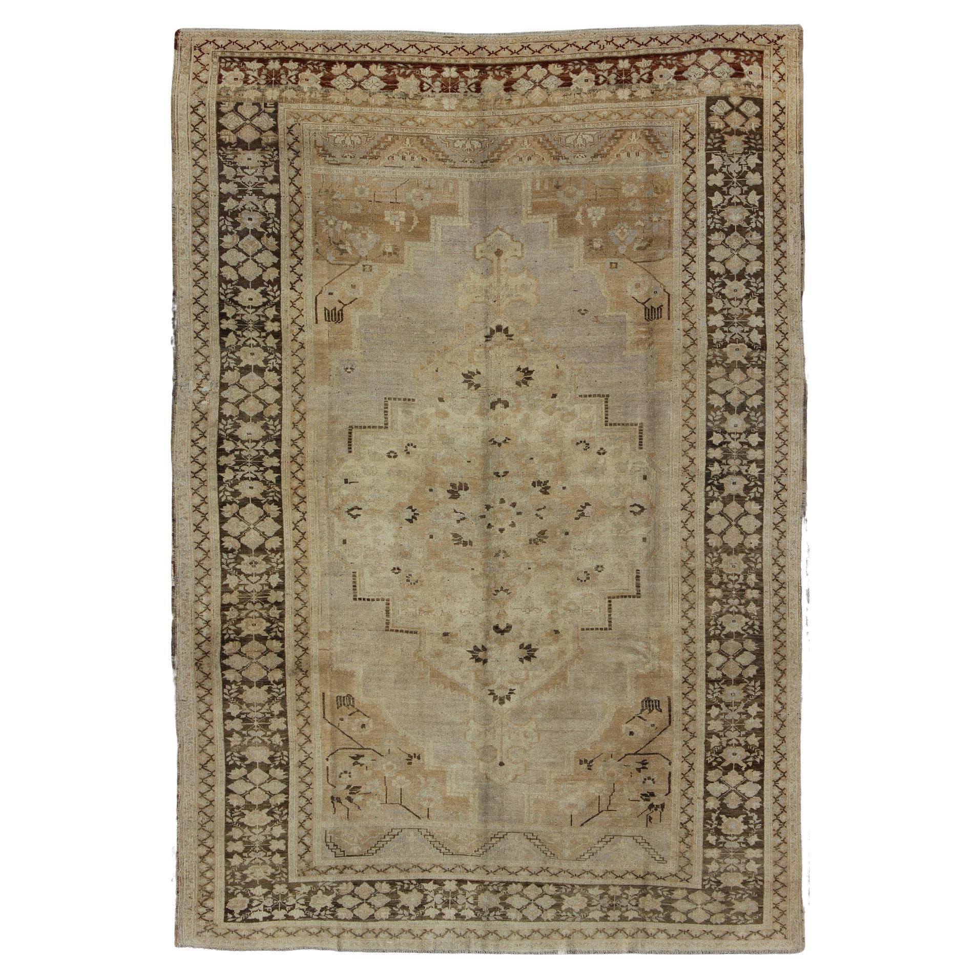 Vintage Turkish Floral Medallion Oushak Rug in Tan, Brown, and Beige For Sale