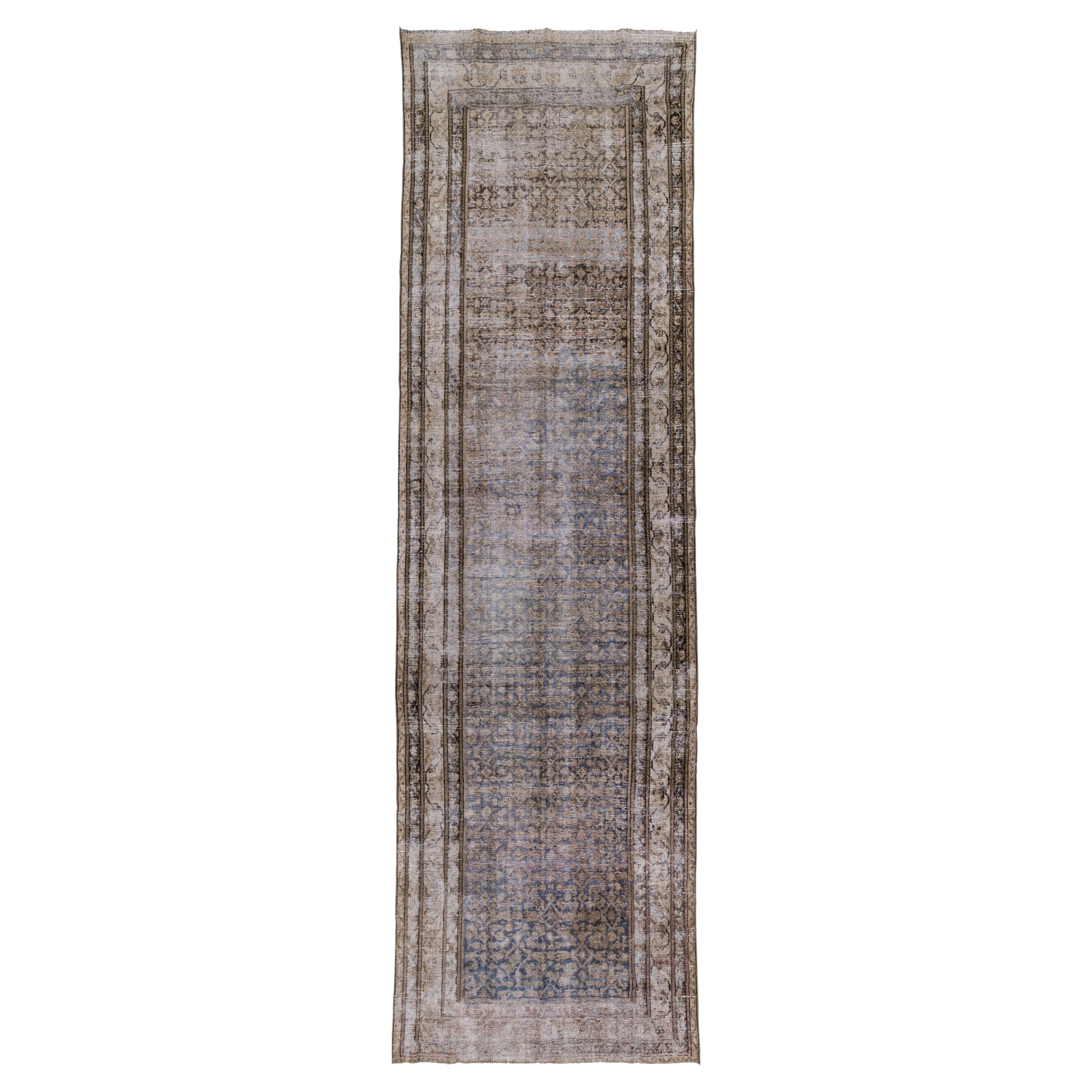 Lovely textural runner in a hard to find size. We love the subtle neutral field and pops of blue in the design. 


