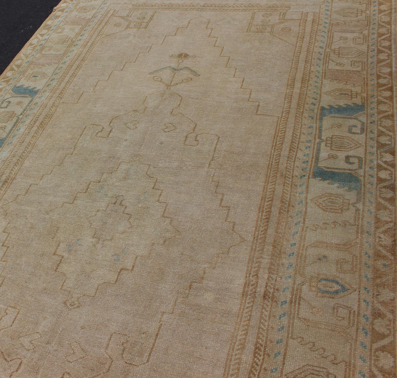 Hand-Knotted Vintage Turkish Gallery Rug in Earth Tones & Light Brown with Medallions  For Sale