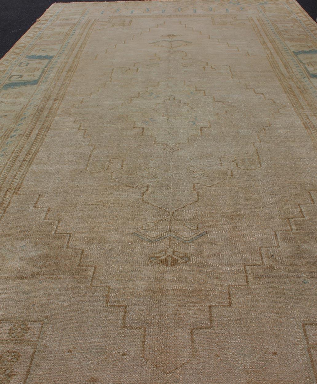 20th Century Vintage Turkish Gallery Rug in Earth Tones & Light Brown with Medallions  For Sale