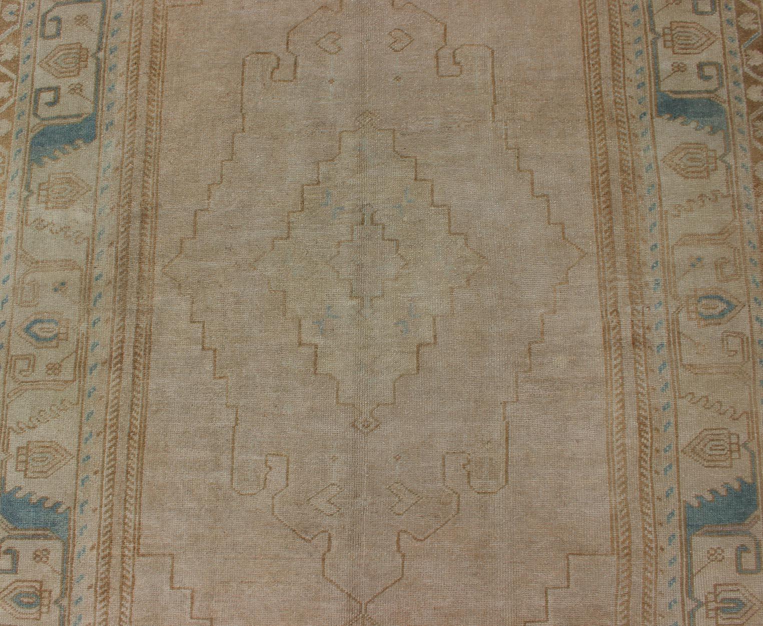 Wool Vintage Turkish Gallery Rug in Earth Tones & Light Brown with Medallions  For Sale