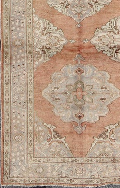 Turkish Oushak Gallery Rug with Faded Terracotta Field and Pale Blue Medallions