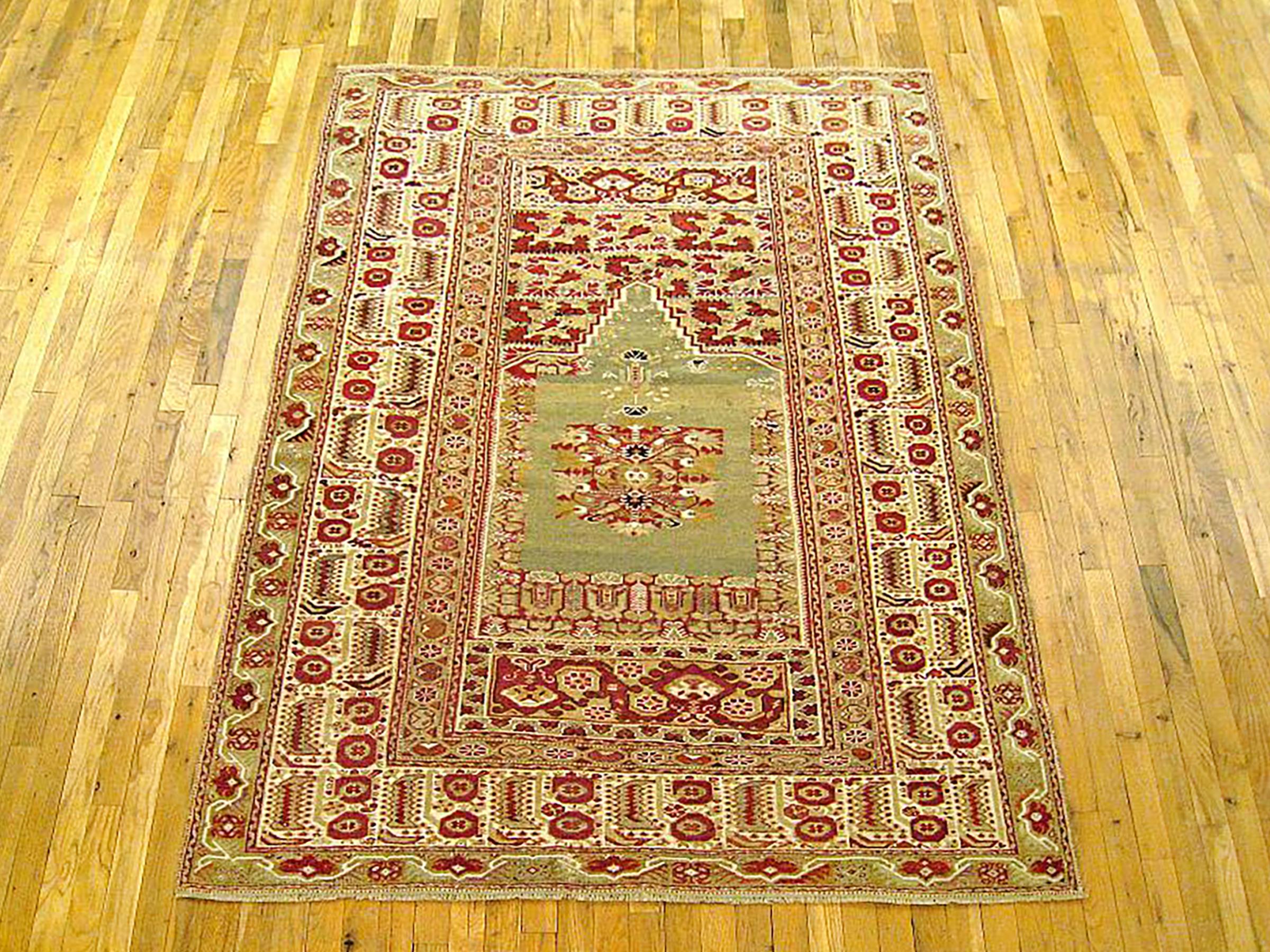 Vintage Turkish Ghiordes Decorative Rug, Small size, with Medium blue Field

A gorgeous vintage Turkish Ghiordes carpet, circa 1940, size 7'1” x 5'0”. This lovely carpet features  a central medallion in a directional design on the medium blue