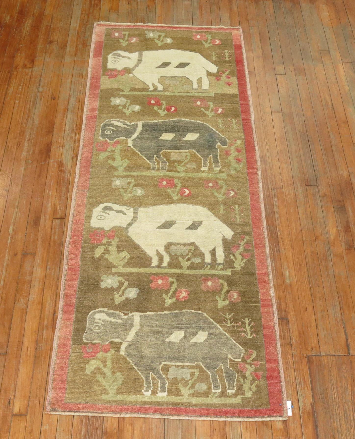 One of a kind decorative caliber vintage Turkish rug with what looks to be 4 lonely sheep or goats.