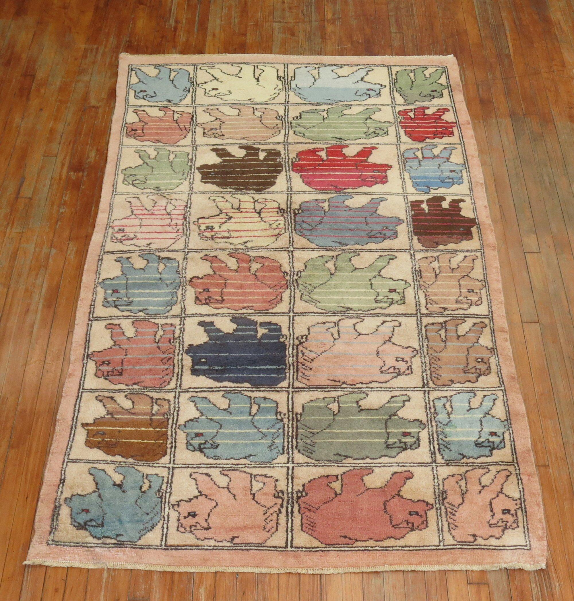 A third quarter of the 20th century Turkish rug depicting 32 different bears on a grid like pattern. Pretty cool!

Measures: 4'9