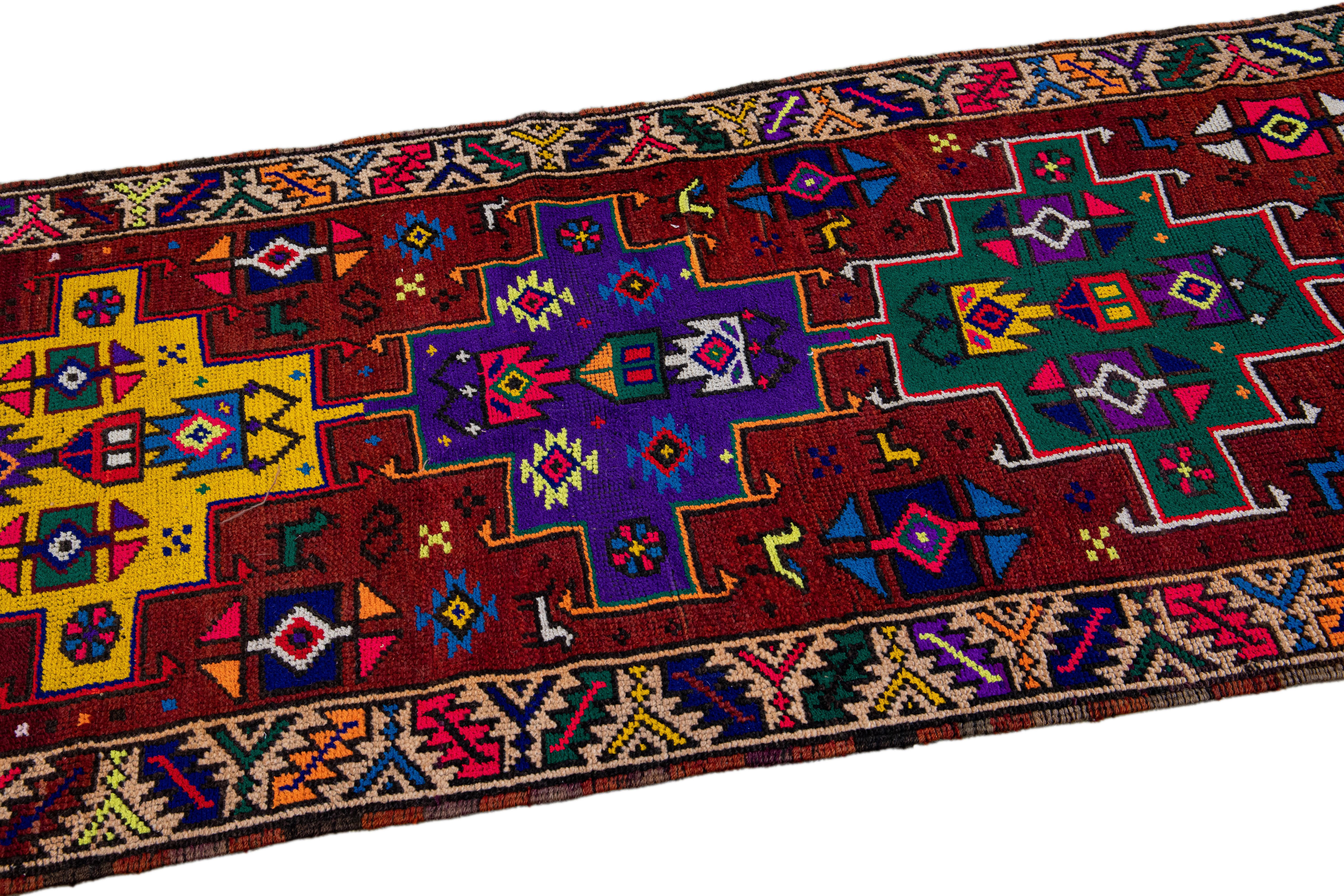 Vintage Turkish Handmade Multicolor Tribal Pattern Burgundy Wool Runner For Sale 2