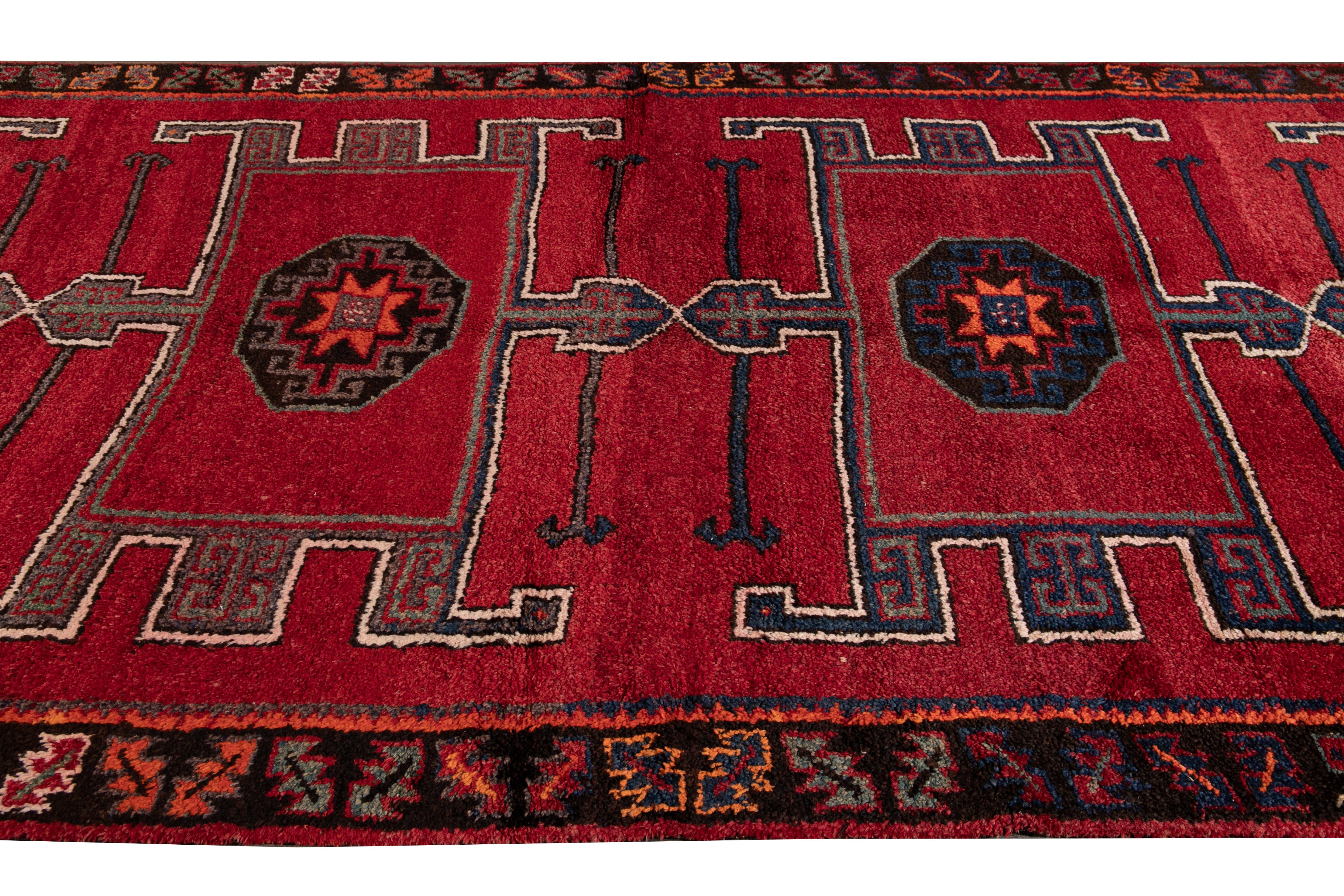 20th Century Vintage Turkish Handmade Red Tribal Wool Runner For Sale