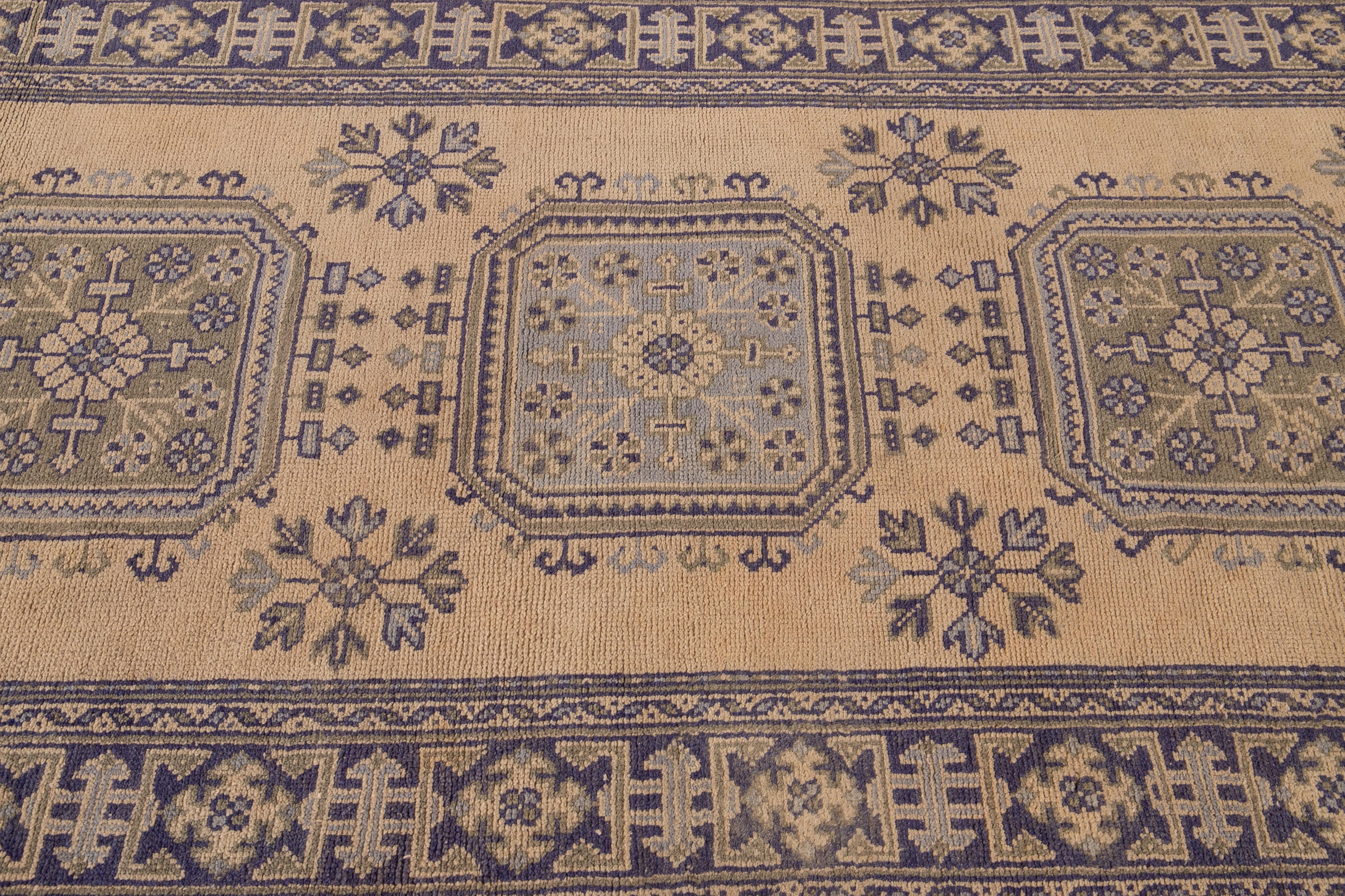 Hand-Knotted Vintage Turkish Handmade Tribal Motif Tan & Blue Wool Runner For Sale