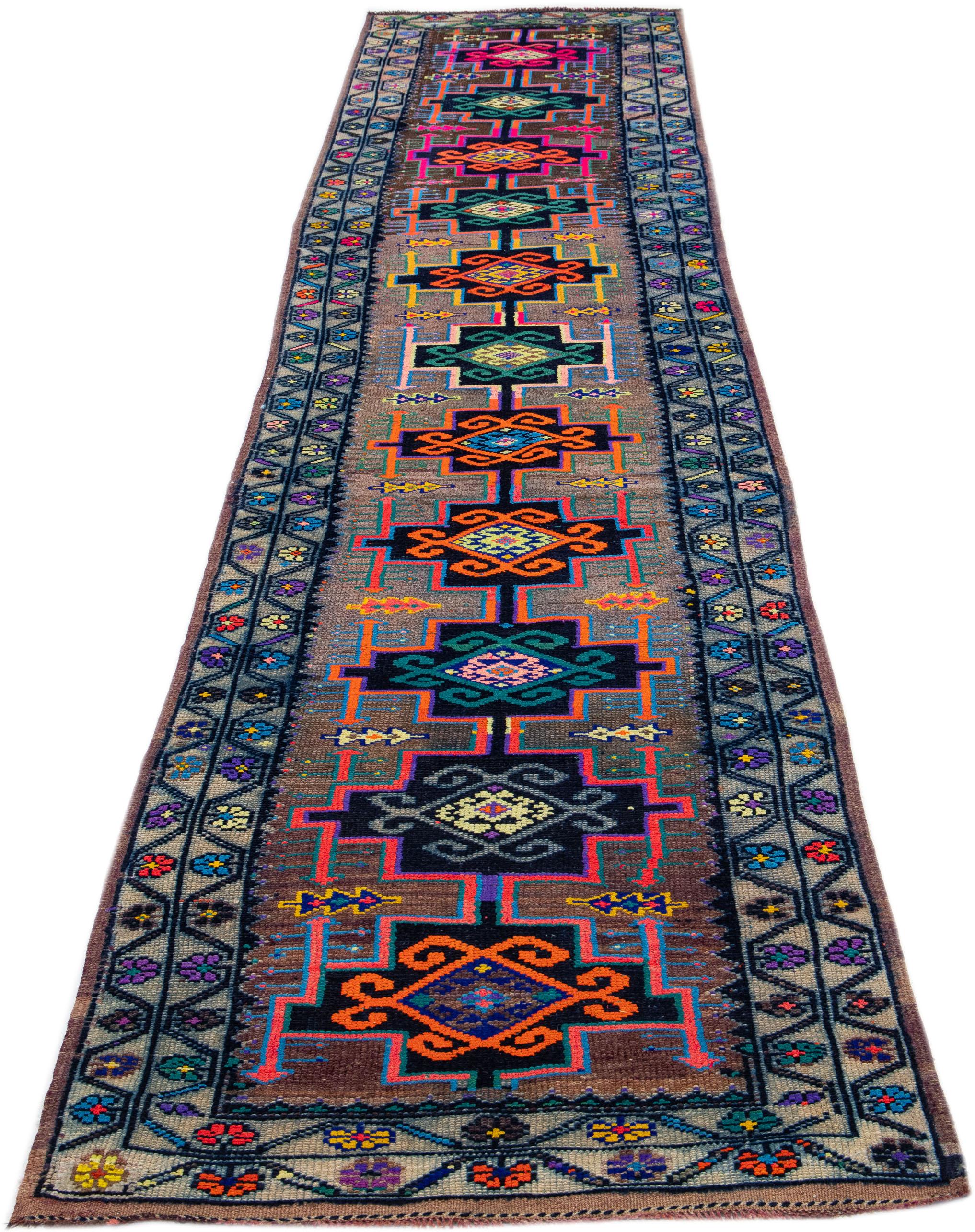 Mid-Century Modern Vintage Turkish Handmade Wool Runner with Multicolor Tribal Motif For Sale