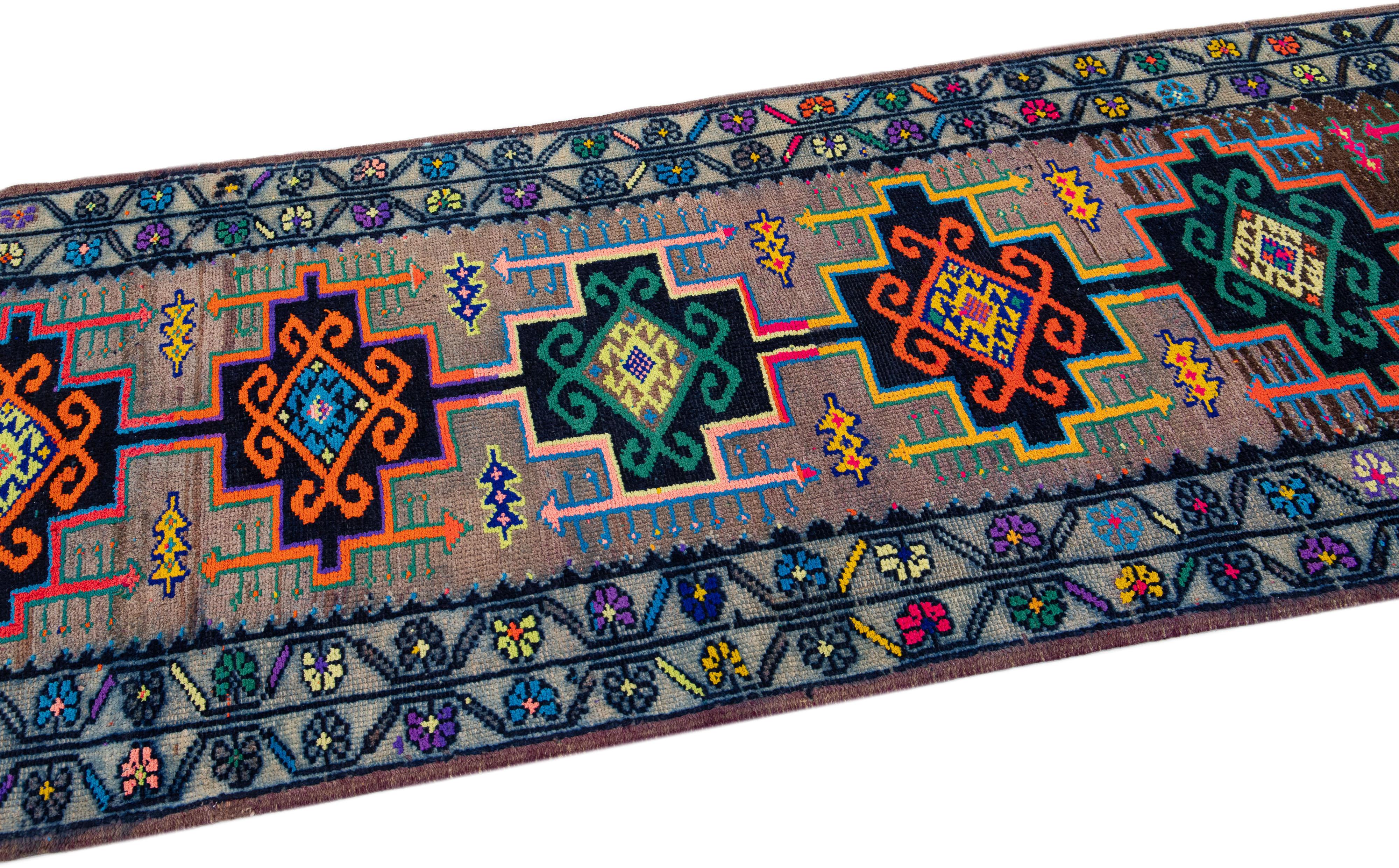 Vintage Turkish Handmade Wool Runner with Multicolor Tribal Motif In Excellent Condition For Sale In Norwalk, CT
