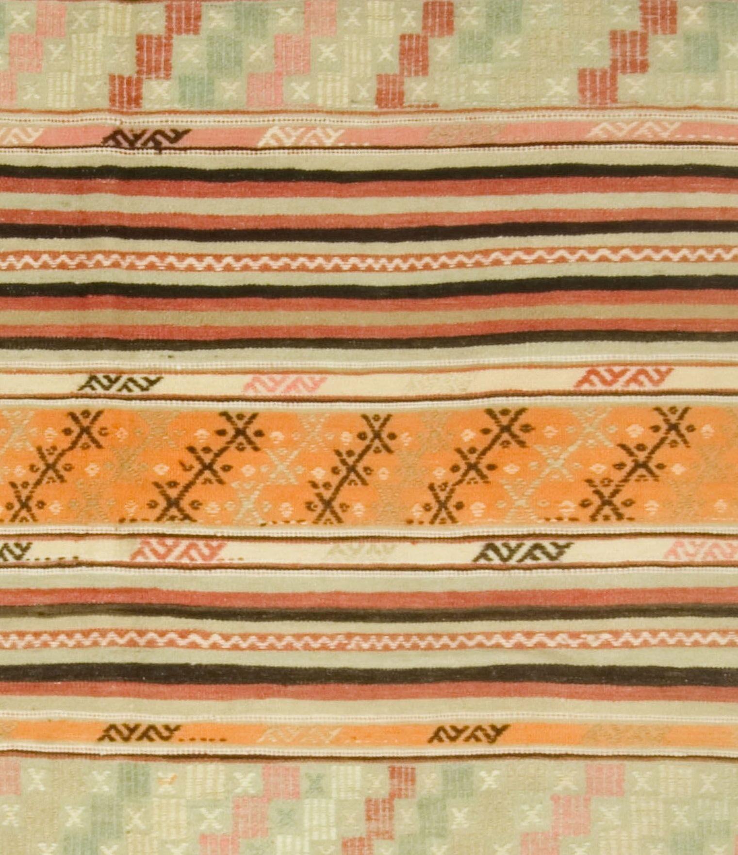 Vintage Turkish Handwoven Kilim Rug 5'4 x 9'5. This vintage Turkish flat-weave Kilim was handwoven in the 1950s. The simplicity and boldness of these pieces can also give a contemporary feel and can look at home in both a modern or traditional