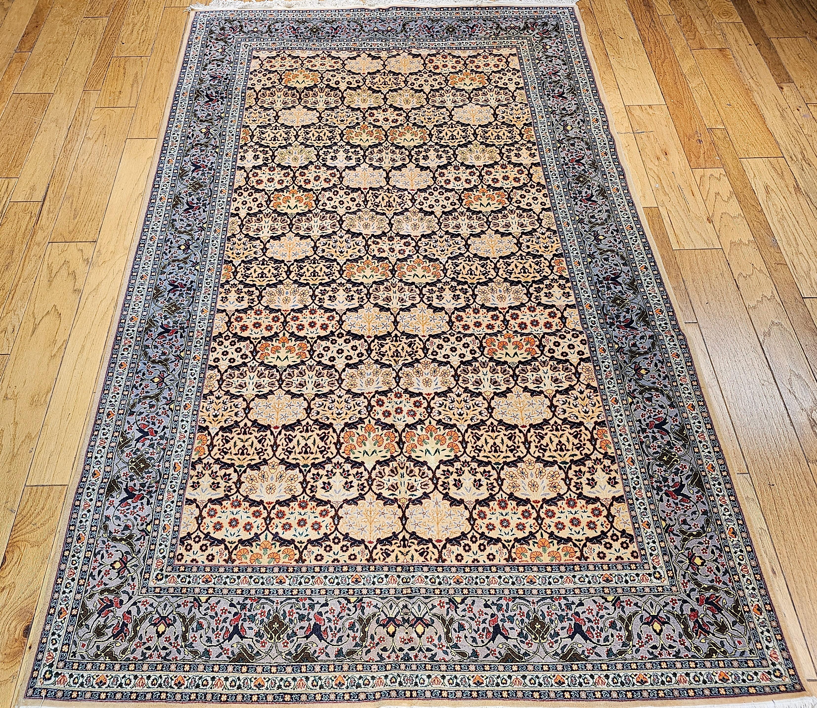 A vintage Turkish Hereke room size rug in a beautiful 