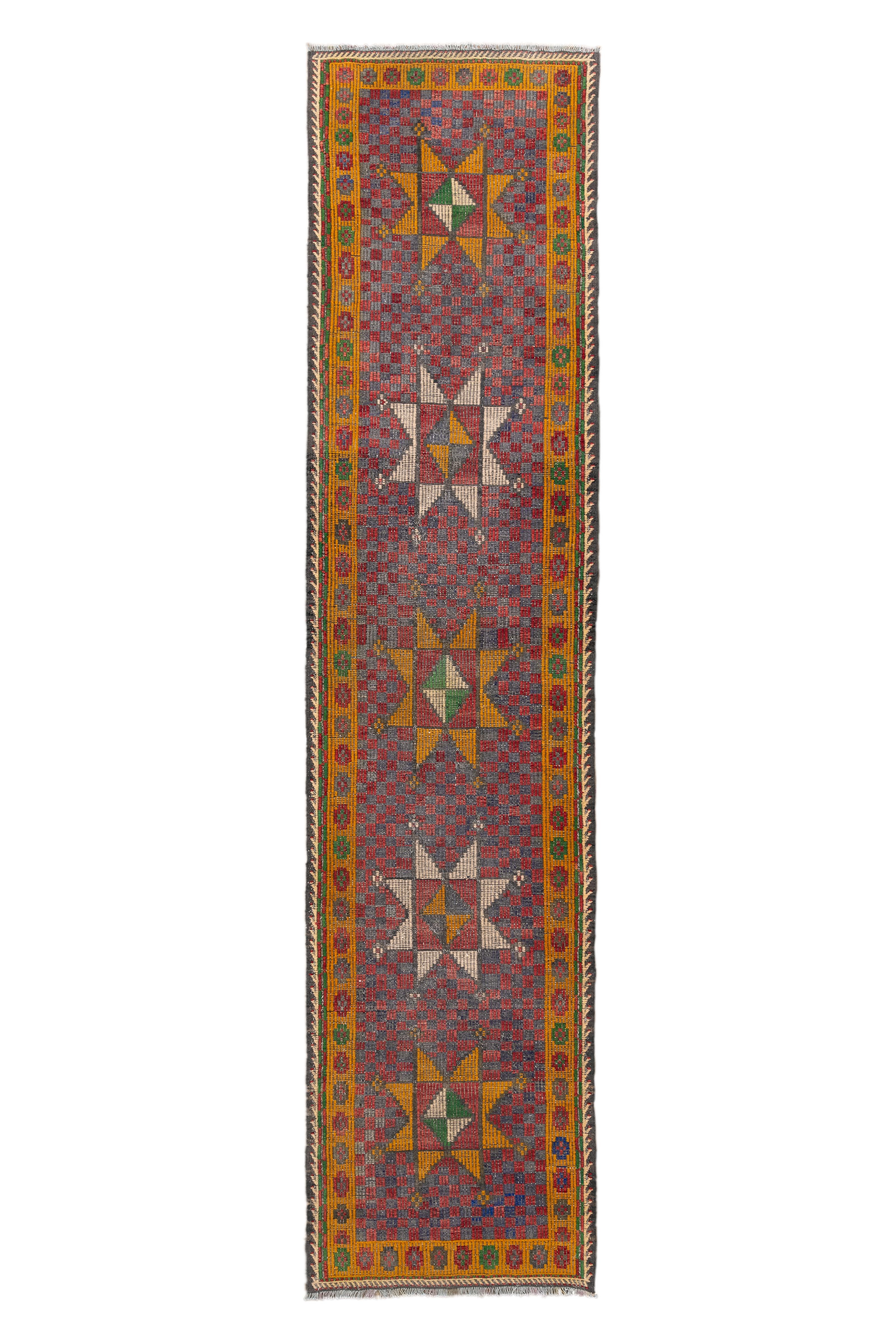 A rare and vibrant Turkish Jijim runner, this piece features a mesmerizing series of geometric eight-pointed star medallions alternating in multicolor across a finely patterned blue field. The composition is framed by a wide border of stylized
