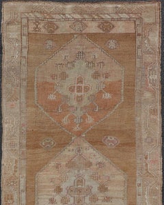 Vintage Turkish Kars Gallery Runner with Geometric Medallions in Soft Earth Tone