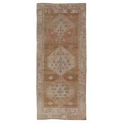 Vintage Turkish Kars Gallery Runner with Geometric Medallions in Soft Earth Tone