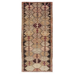 Vintage Turkish Kars Gallery Runner With Rich Geometric Motifs and Earthy Tones
