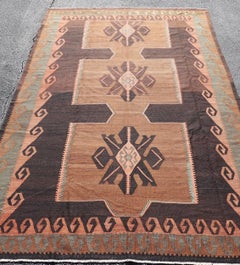 Vintage Turkish Kars Kilim with Bold Medallions in Warm Brown, Orange, and Sage