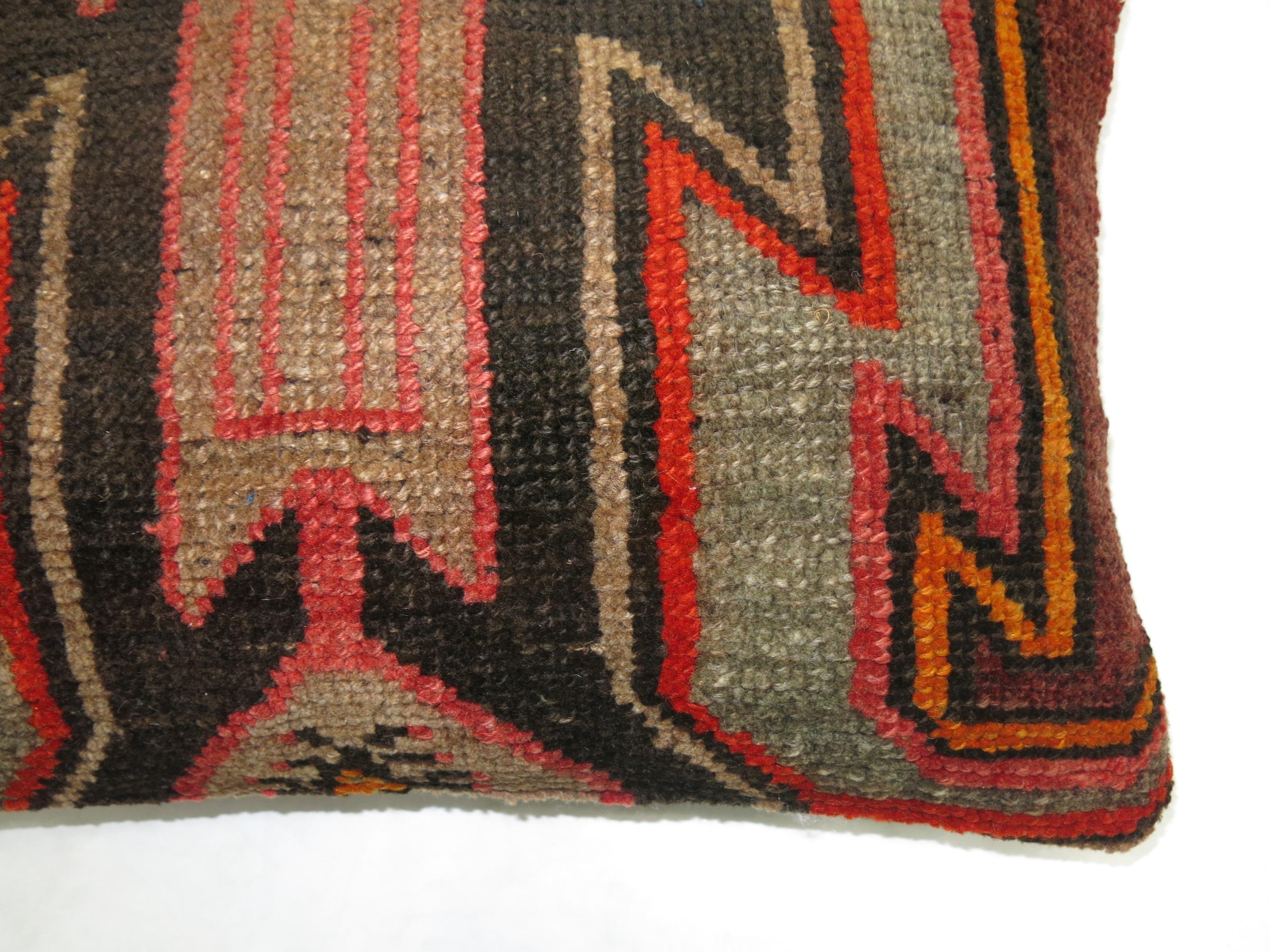 Pillow made from a vintage Turkish Kars rug.

15'' x 23''