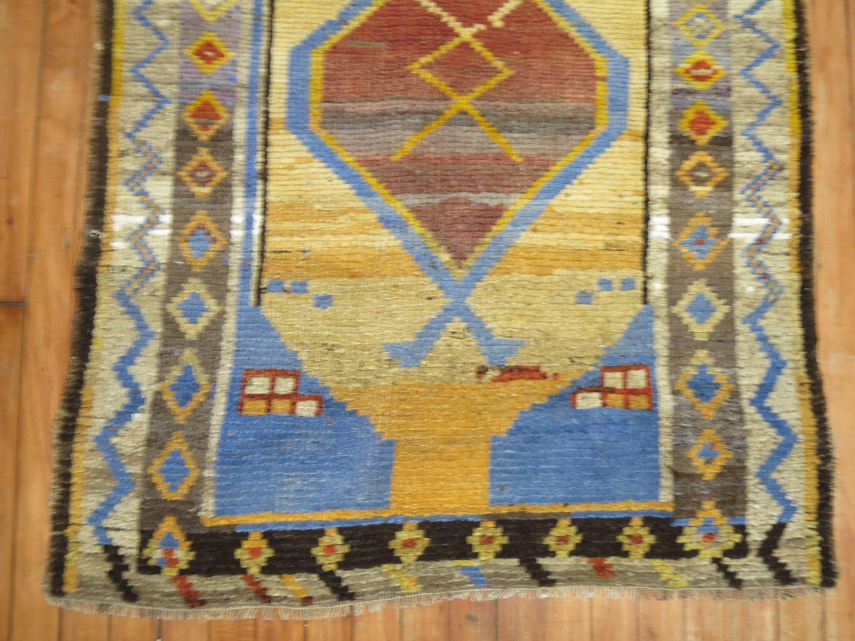 Unique Turkish kars rug woven in central turkey with extra color pop.