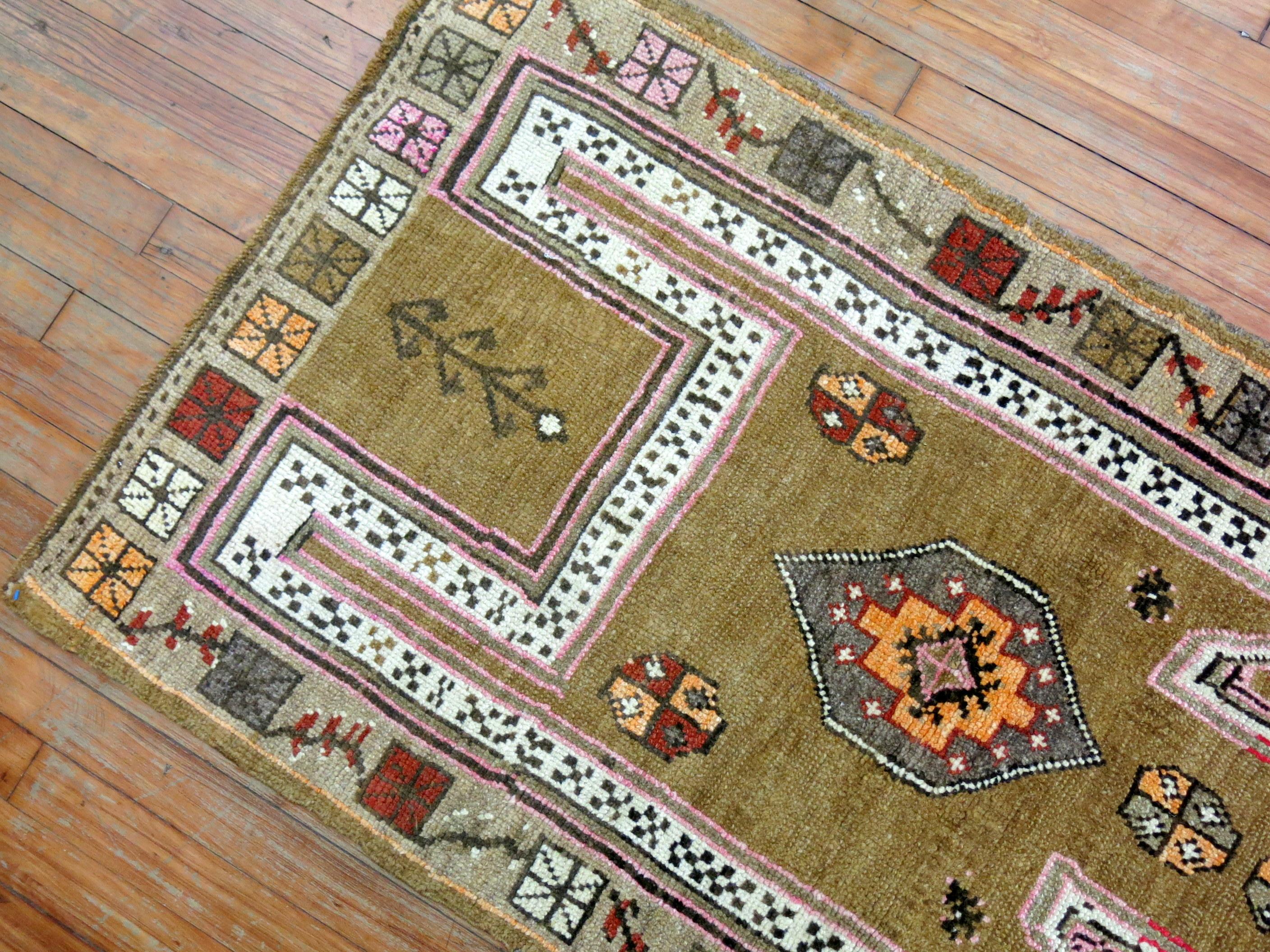 Unique tribal design Turkish Kars rug woven in central turkey with extra color pop.