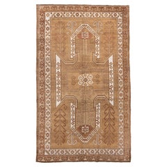 Alfombra turca vintage Kars en tonos tierra con medallón geométrico