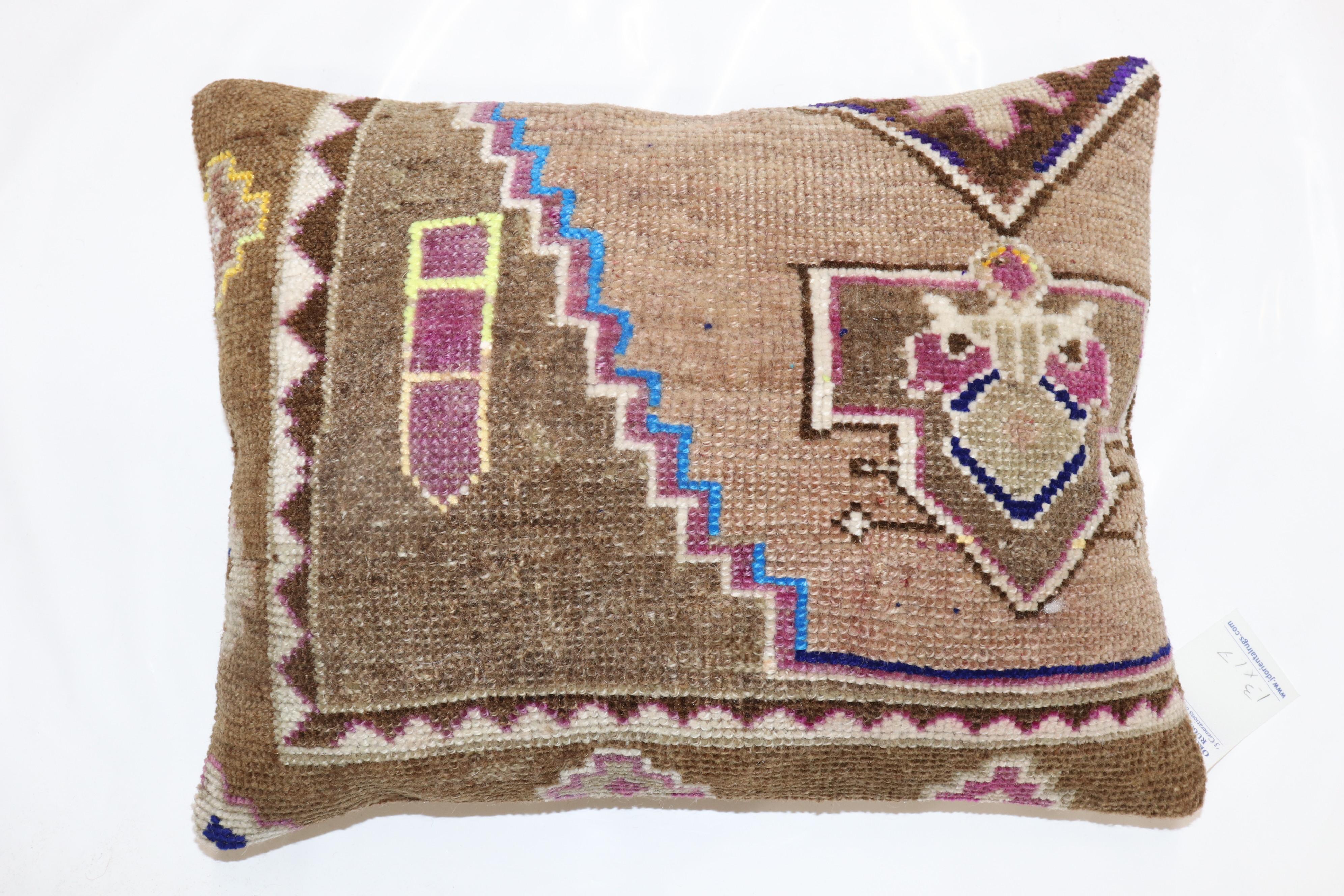 Large Pillow made from a vintage Turkish Kars Rug

Measures: 15'' x 19''.