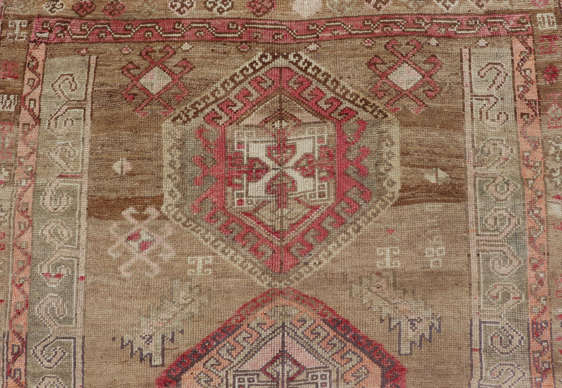 Measures: 6'0 x 12'9 

Vintage Turkish Kars Rug With Earthy Browns and Vibrant Reds 6'0 x 12'9.
Keivan Woven Arts / Rug / EN-15223 Country of origin / type: Turkey / Kars

 exquisite Vintage Turkish Kars rug features a rich and captivating blend of