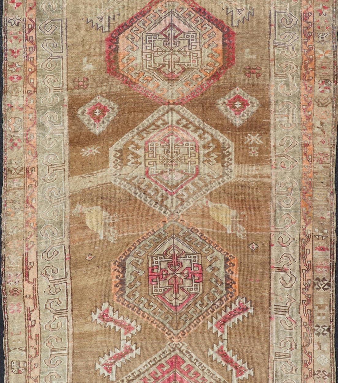 Wool Vintage Turkish Kars Rug With Earthy Browns and Vibrant Reds 6'0 x 12'9 For Sale