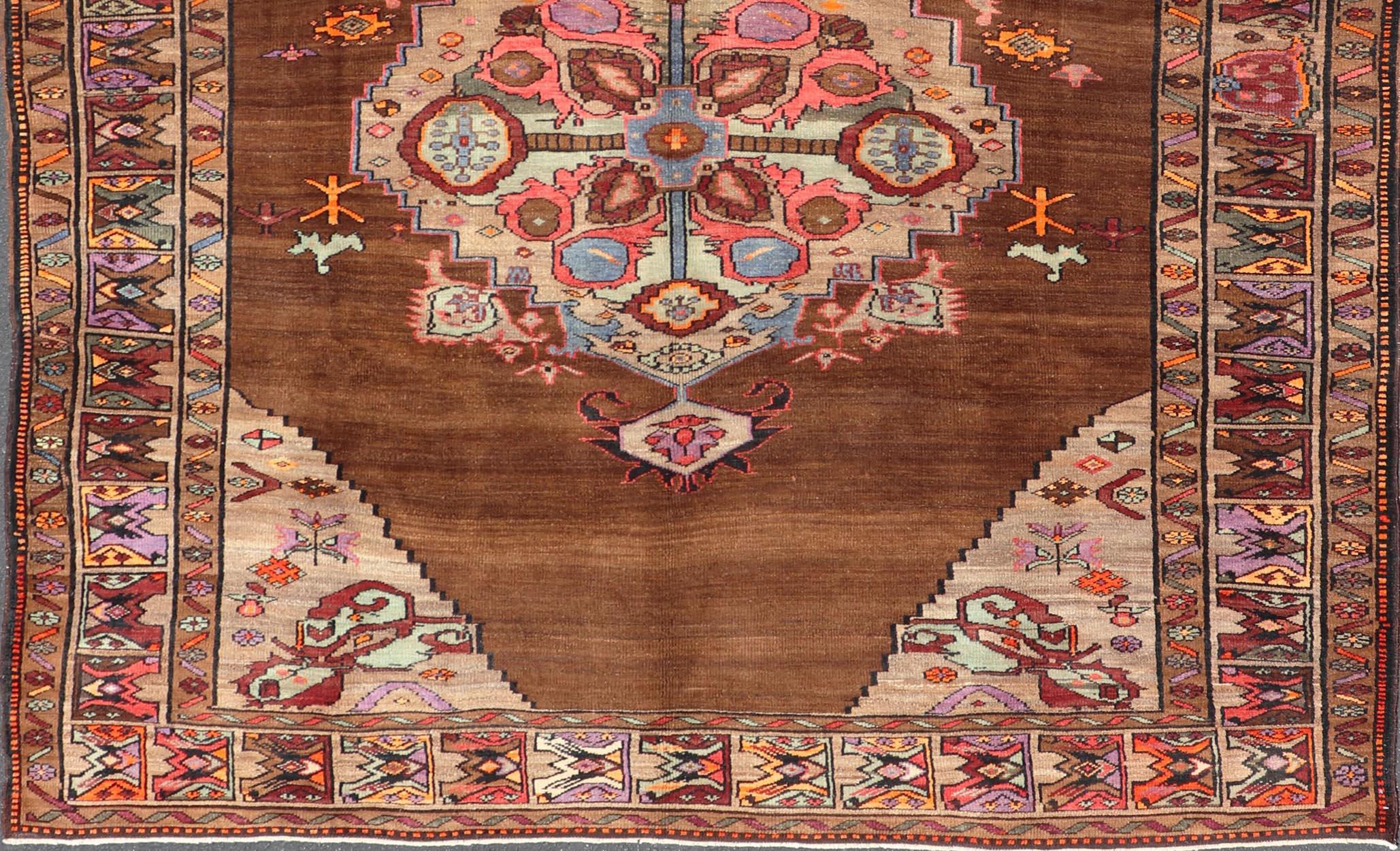 Vintage Turkish Kars Rug With Medallion On A Brown Field with Pops of Color  For Sale 2