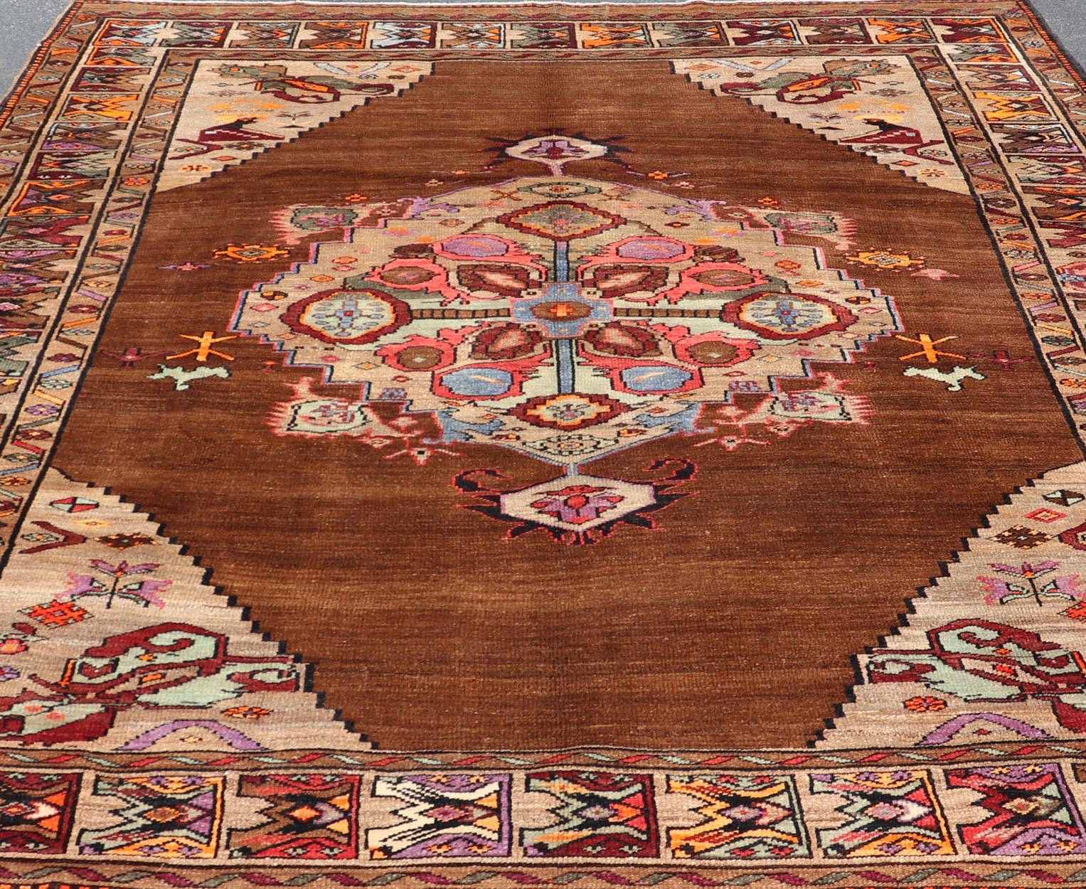 Vintage Turkish Kars Rug With Medallion On A Brown Field with Pops of Color  For Sale 3