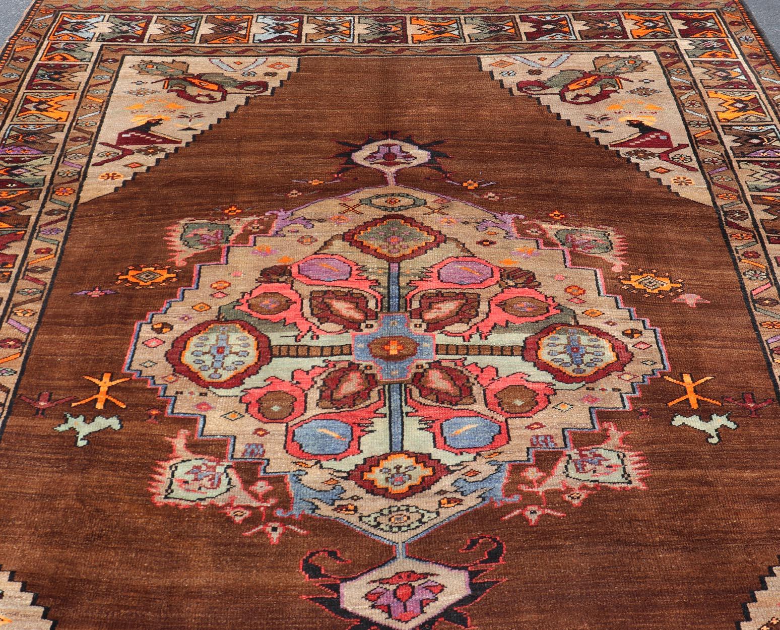 Vintage Turkish Kars Rug With Medallion On A Brown Field with Pops of Color  For Sale 4