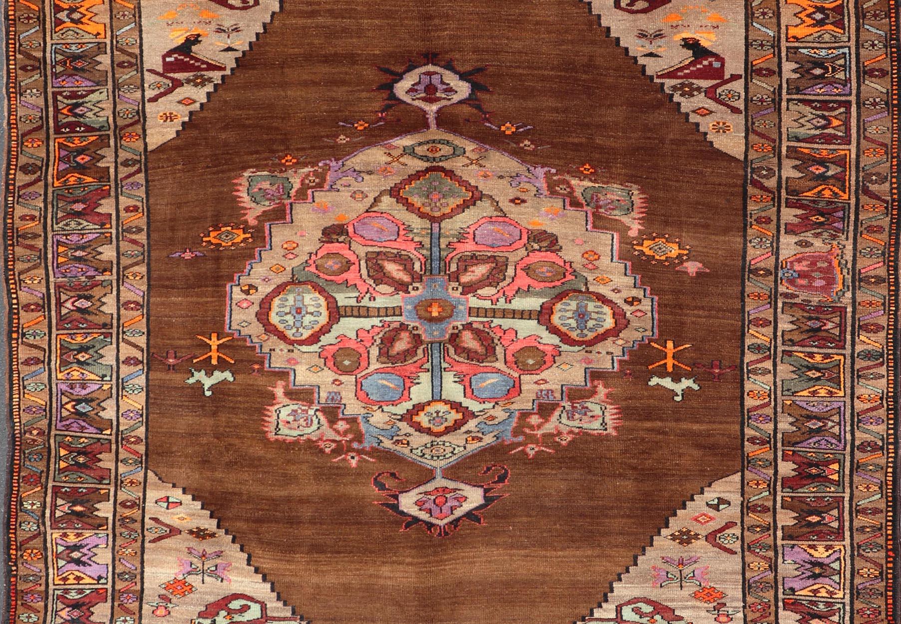 Vintage Turkish Kars Rug With Medallion On A Brown Field with Pops of Color  For Sale 1