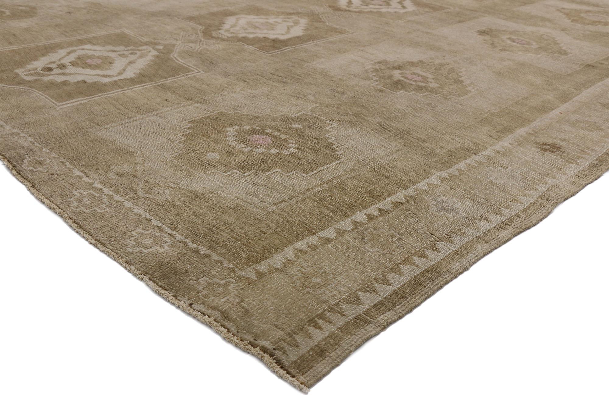 52456 Vintage Turkish Kars Rug with Modern Mission Style 10'00 x 10'08. This hand-knotted wool vintage Turkish Oushak rug features three columns of large-scale Kotchanak motifs filled with stepped medallions. Derived from the virility of the Ram's