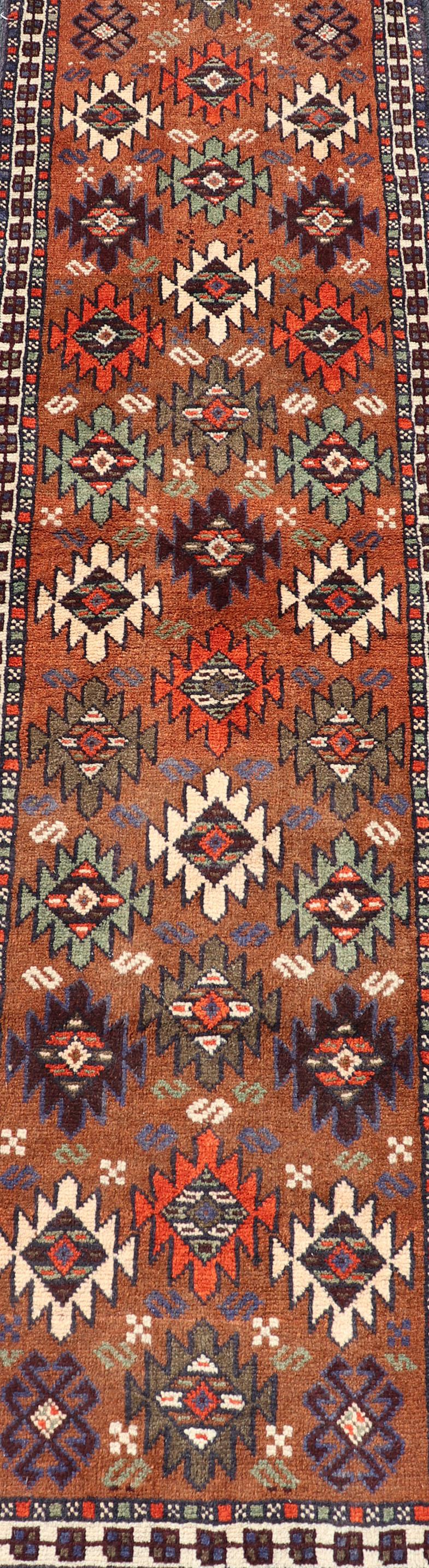 Wool Vintage Turkish Kars Runner with Tribal Motif Design in Orange-Brown Colors For Sale