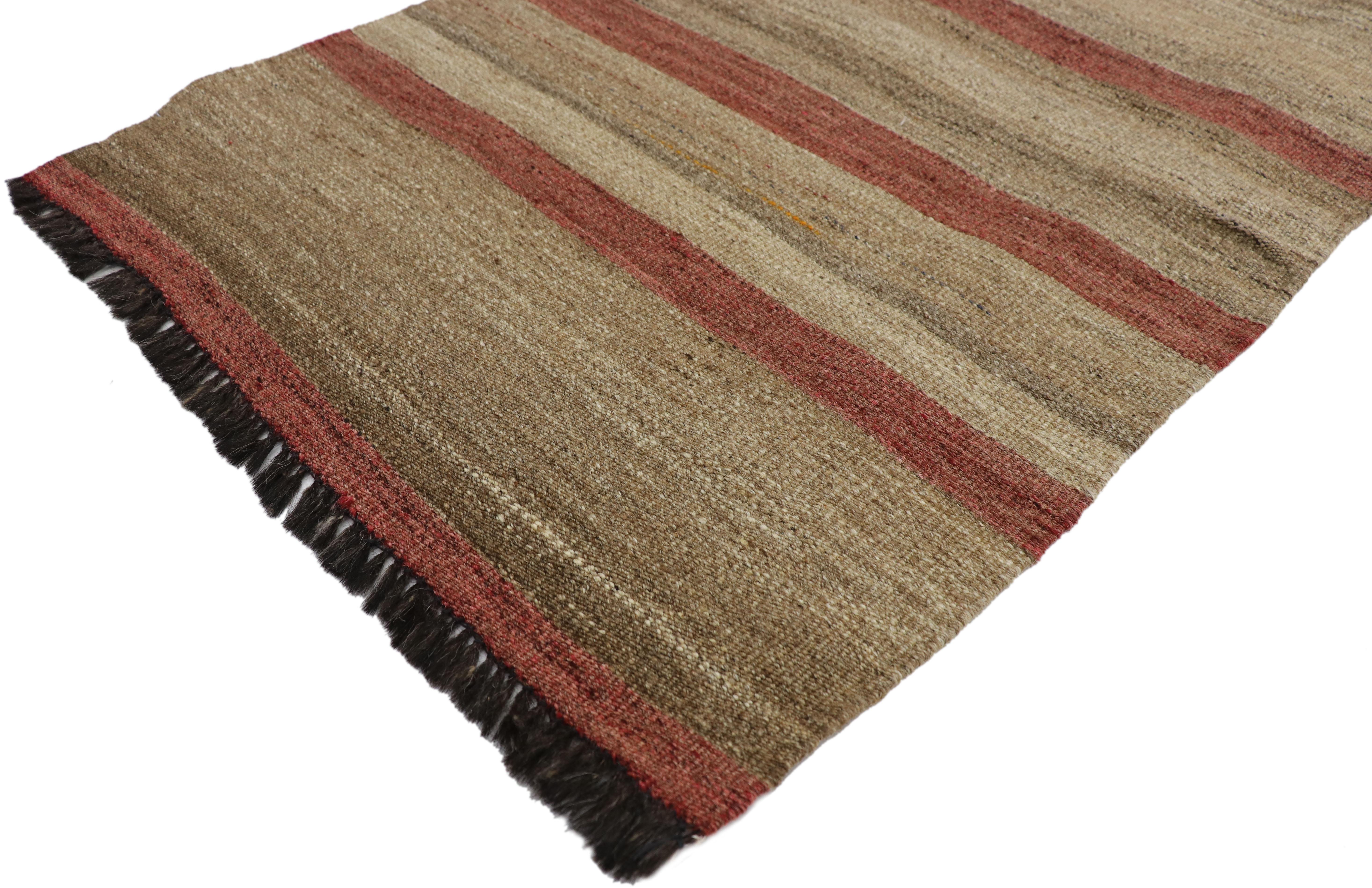 74861, vintage Turkish Kilim rug with Earth Tone colors. This handwoven wool vintage Turkish Kilim accent rug features a striped pattern in rustic earth-tone colors. A fine example of minimalist style, this Turkish Kilim rug embodies the modern