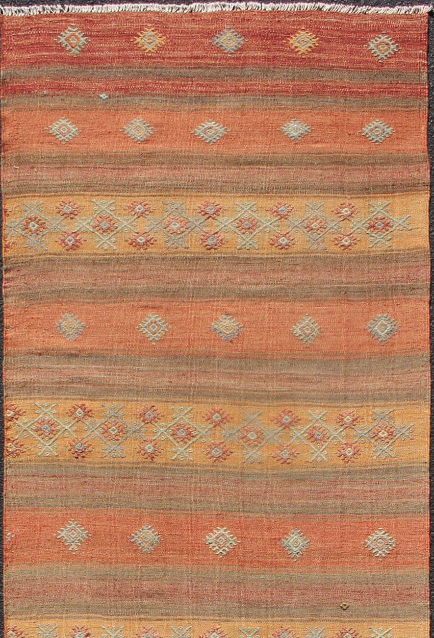 Colorful vintage Turkish Kilim runner with a stripe and modern design, Minimalist stripe design Kilim runner from Turkey, rug TU-NED-630, country of origin / type: Turkey / Kilim, circa 1950

This vintage flat-woven Kilim runner features a