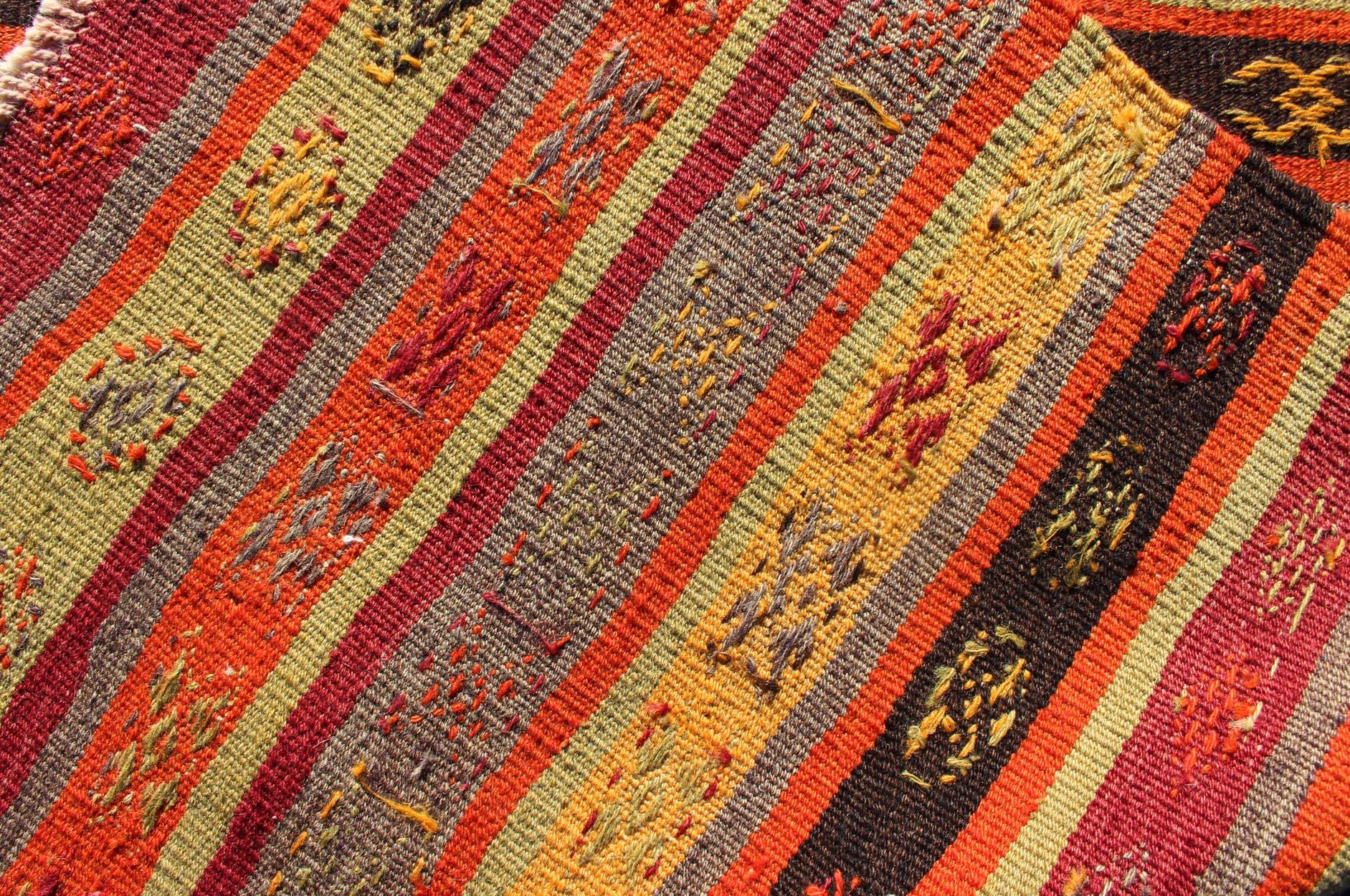 Vintage Turkish Kilim Colorful Stripe Runner with Tribal Motifs In Good Condition For Sale In Atlanta, GA