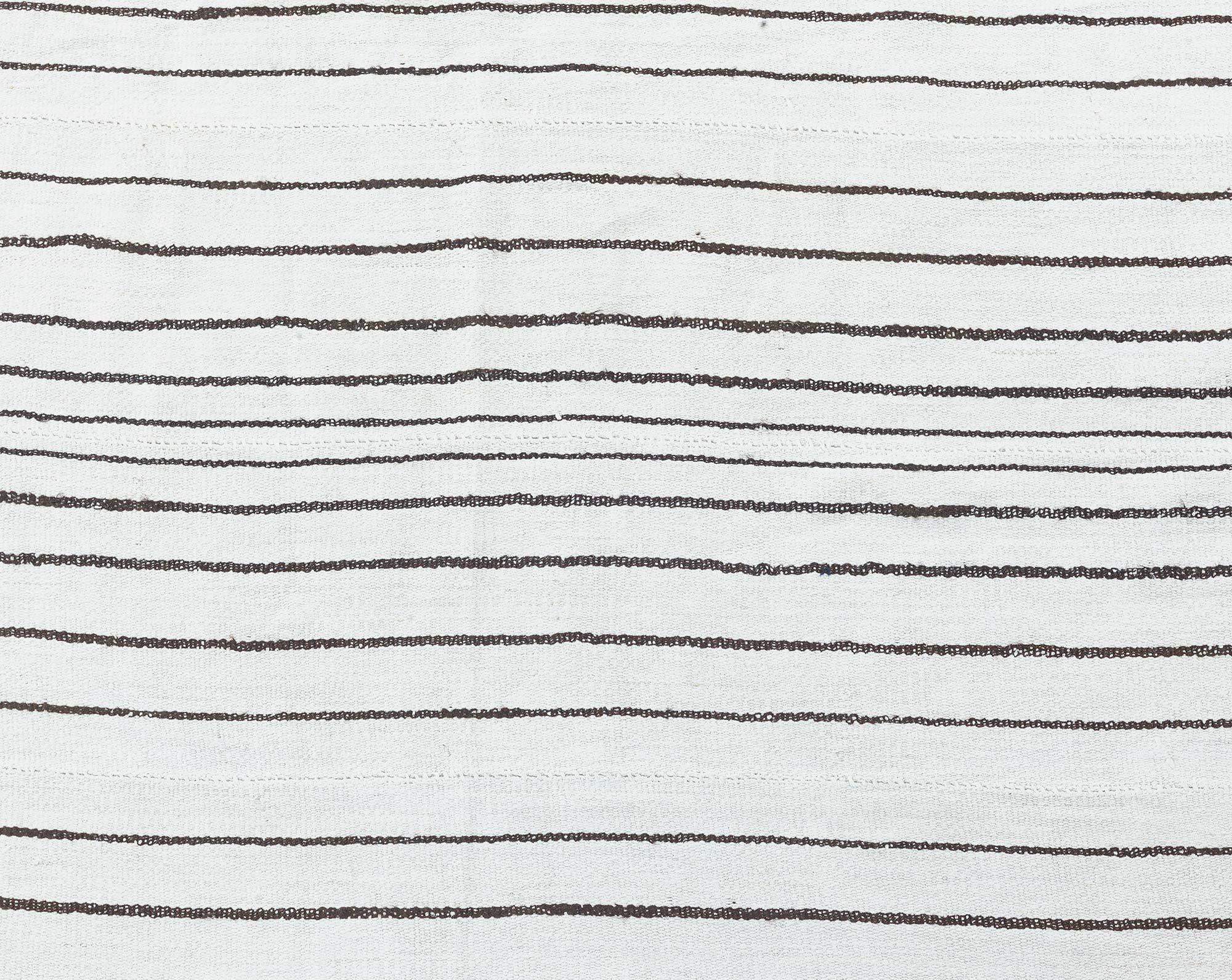 Vintage Turkish Kilim composition striped rug.
Size: 15'2