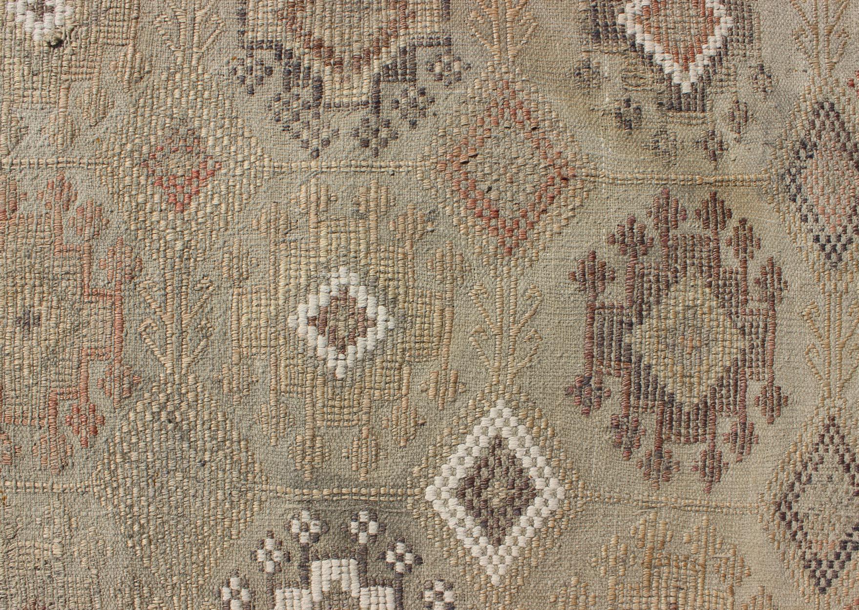 Vintage Turkish Kilim Featuring Muted Colors and All-Over Tribal Motif Design For Sale 4