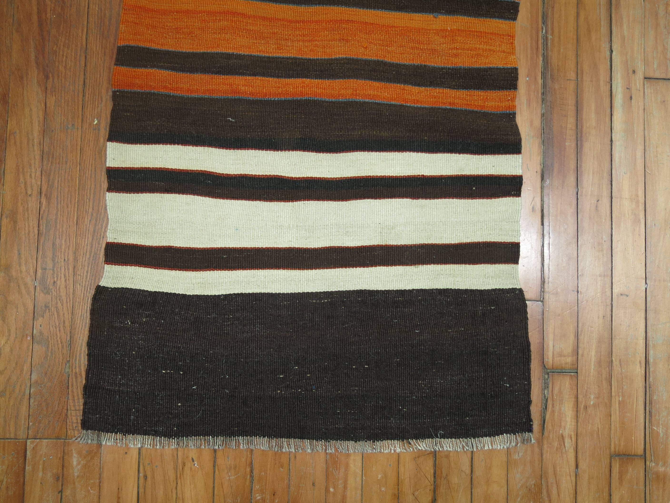 A vintage Turkish Kilim scatter rug from the middle of the 20th century.